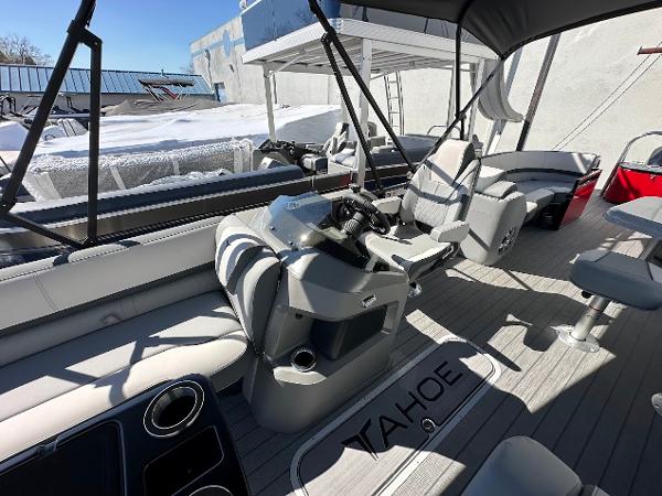 2025 Tahoe Pontoon 2585 LTZ Entertainer interior with helm and seating area.