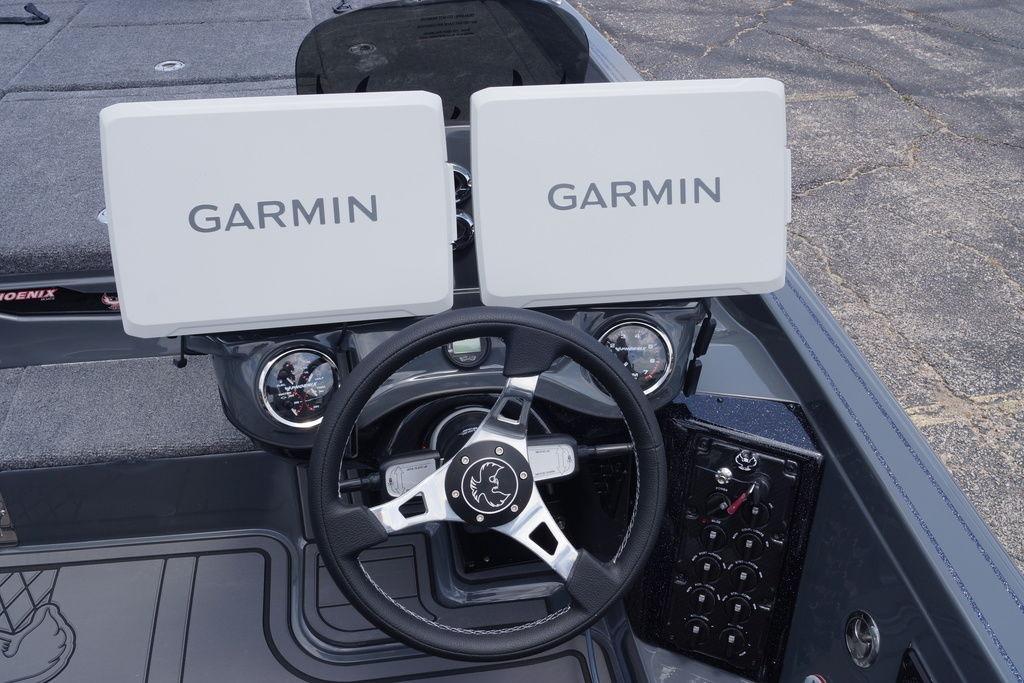 Steering console of 2027 Phoenix 921 Elite X II with dual Garmin displays.
