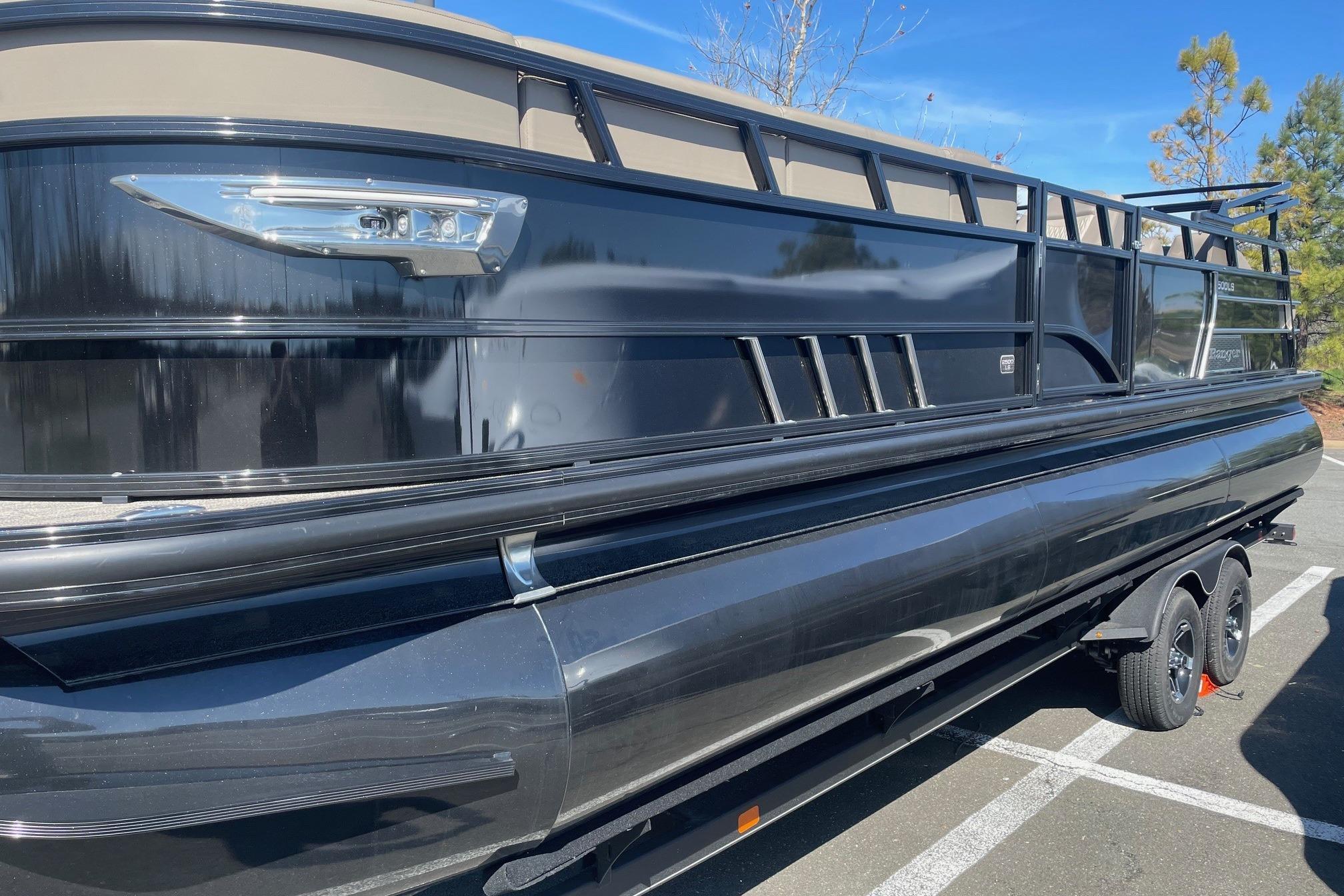 2024 Ranger 2500LS pontoon boat with sleek black exterior on a trailer.