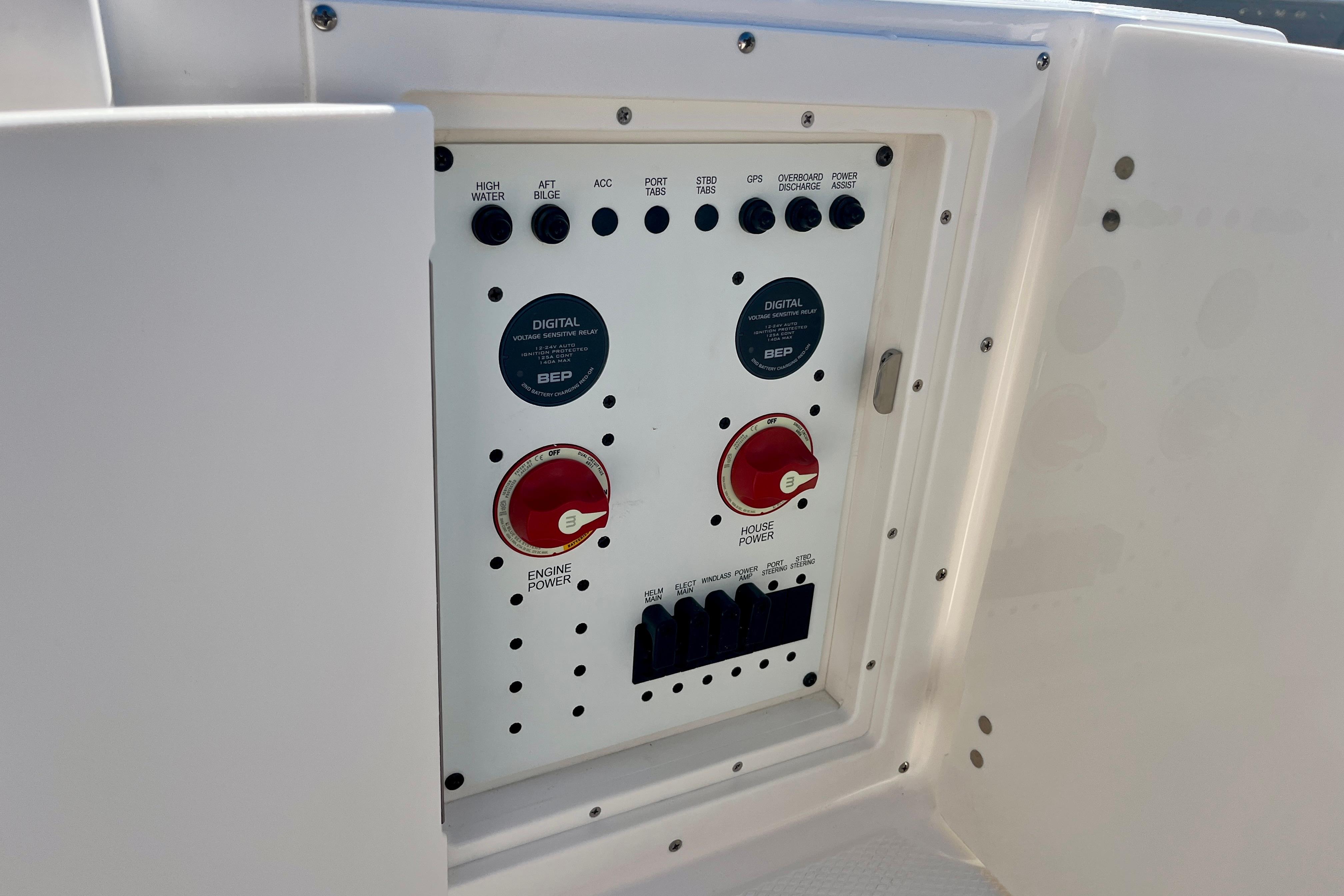 Control panel of 2026 Robalo R270 Center Console boat with switches and power controls.
