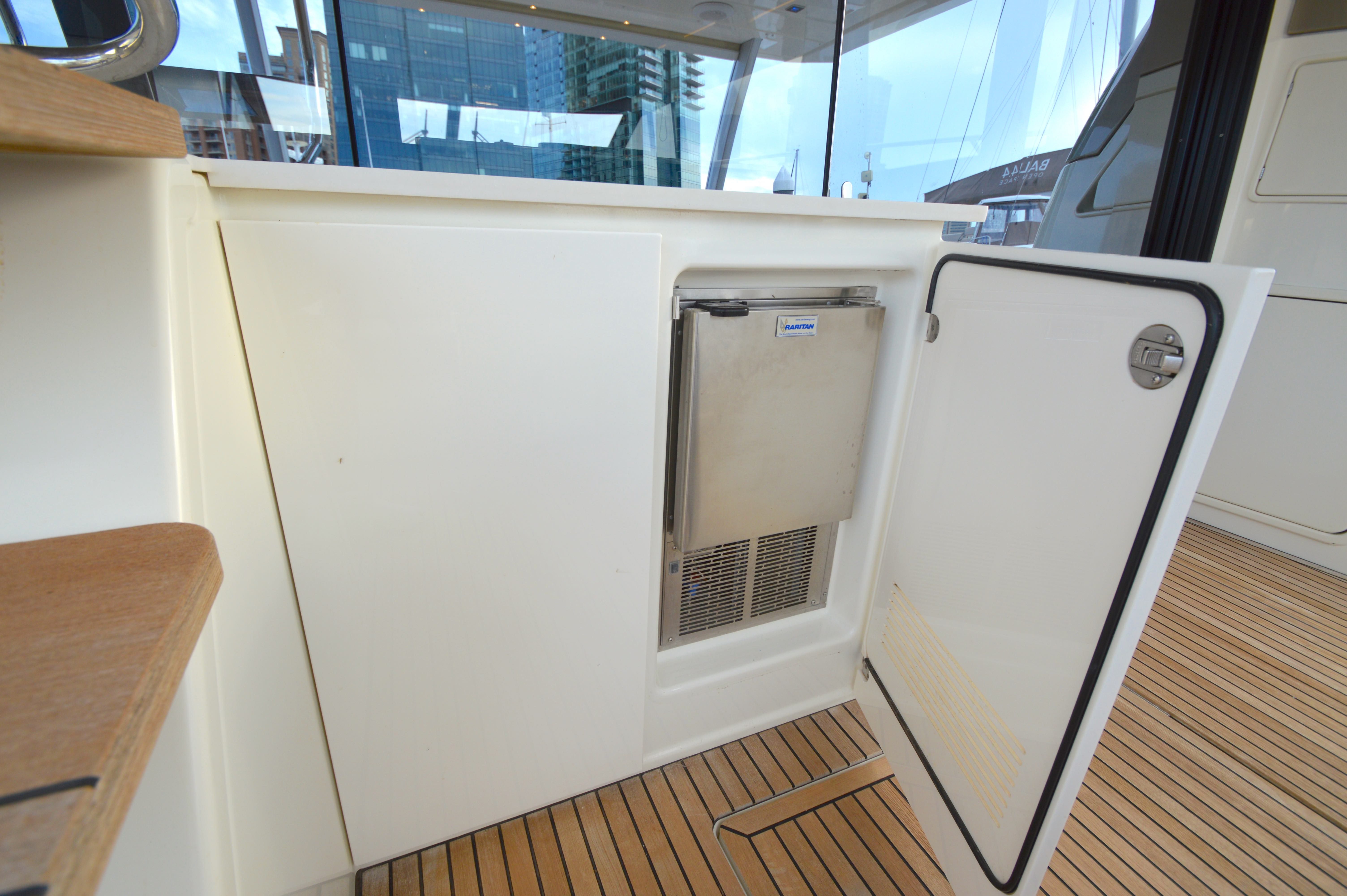 Prestige 630 Yacht 2017 with open refrigerator.
