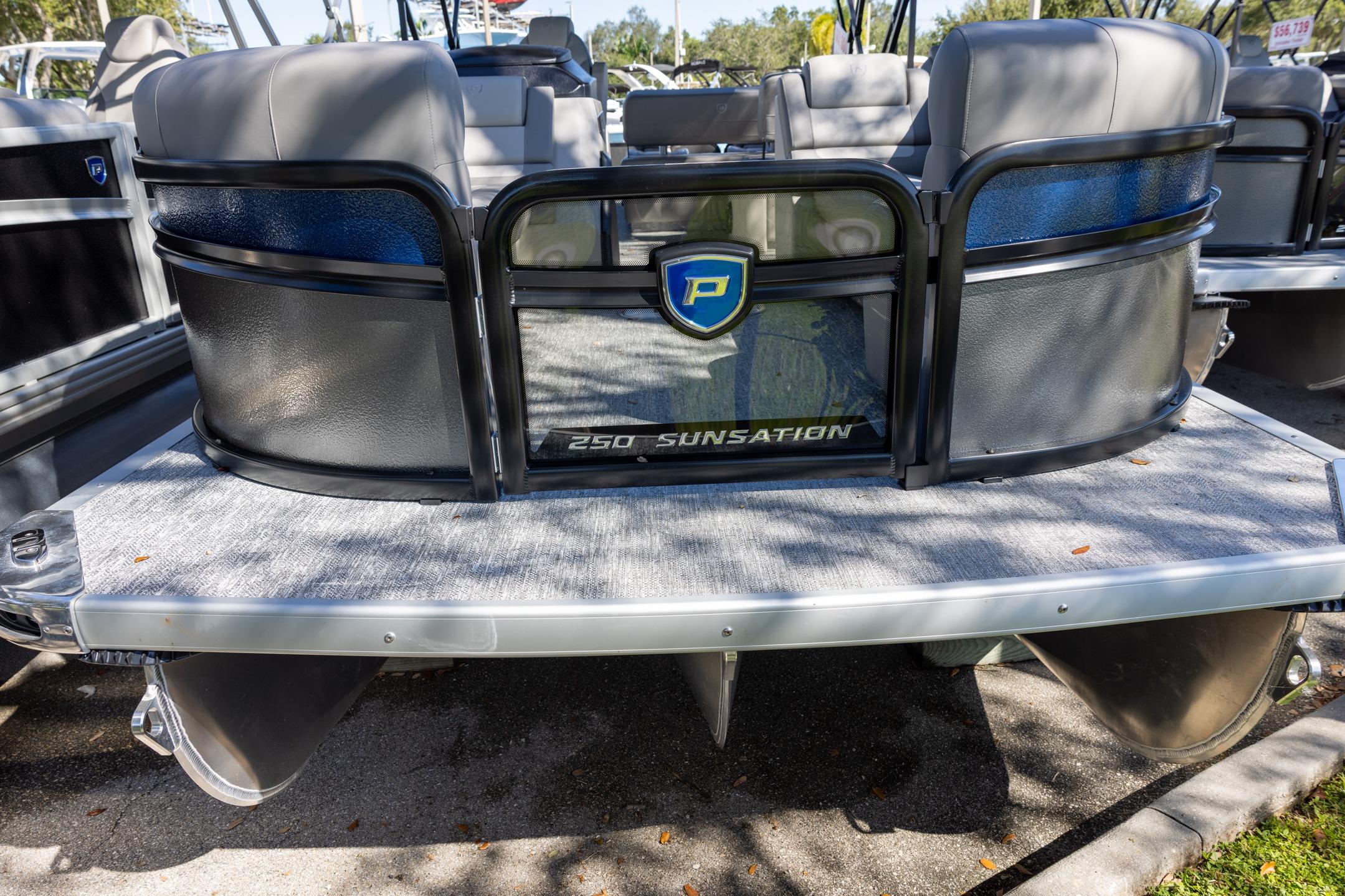 2026 Premier 250 Sunsation RS pontoon boat, rear view with seating and logo.