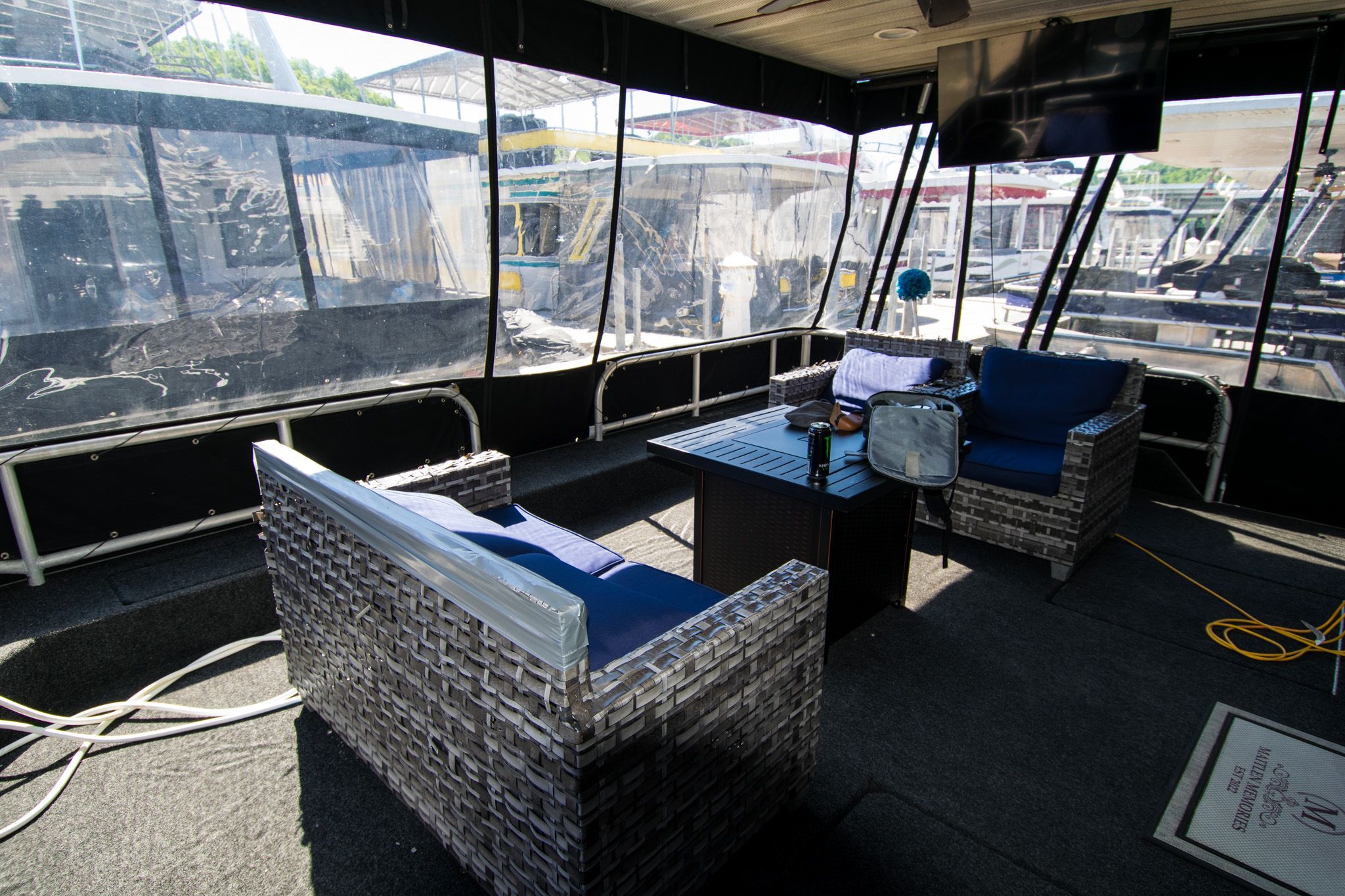 Interior of a 2003 Lakeview 16x70 houseboat with seating area.