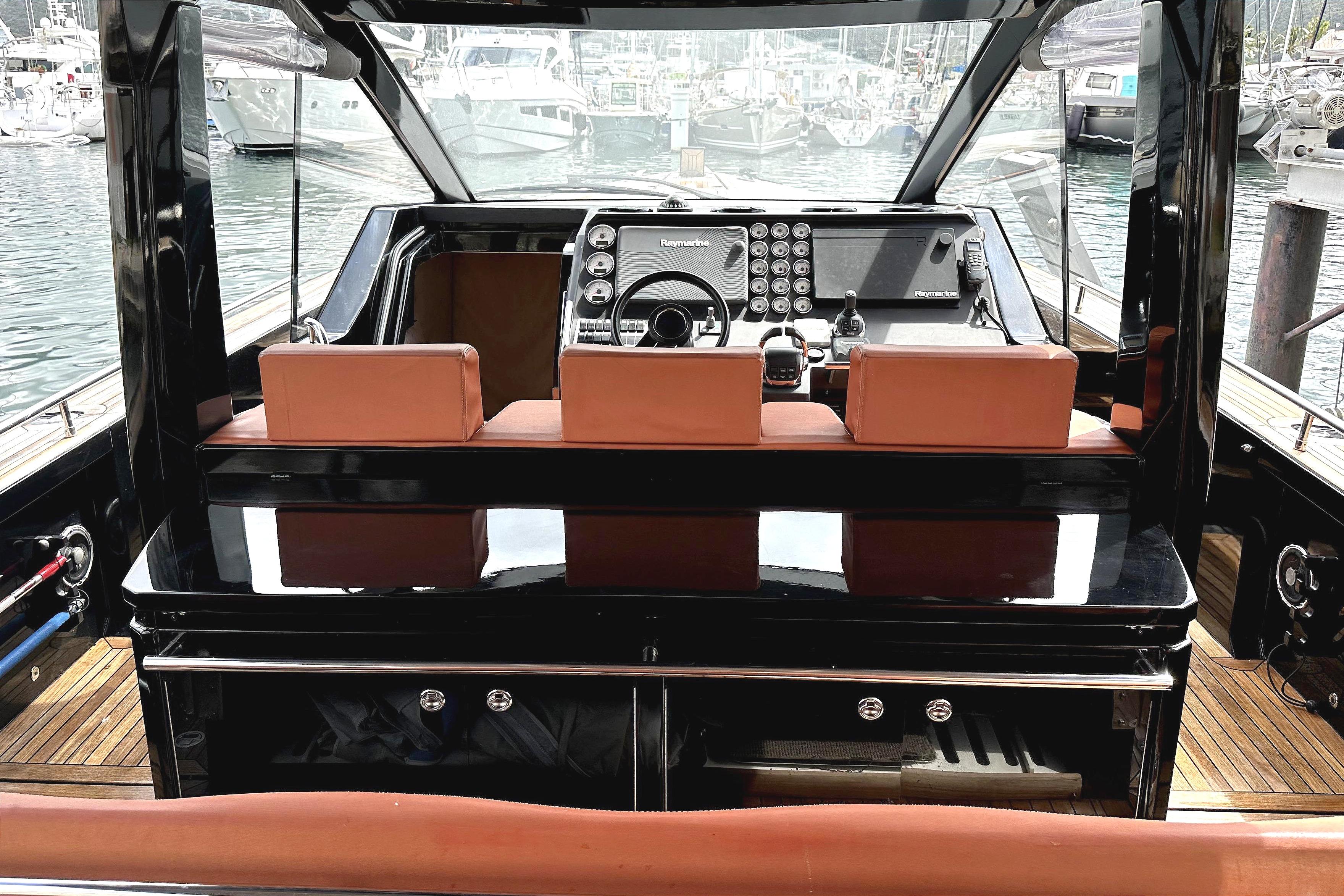Interior view of 2013 Windy SR52 yacht cockpit with modern navigation equipment.