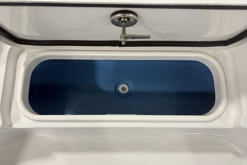 Livewell compartment of 2026 Tidewater 2300 Carolina Bay boat.