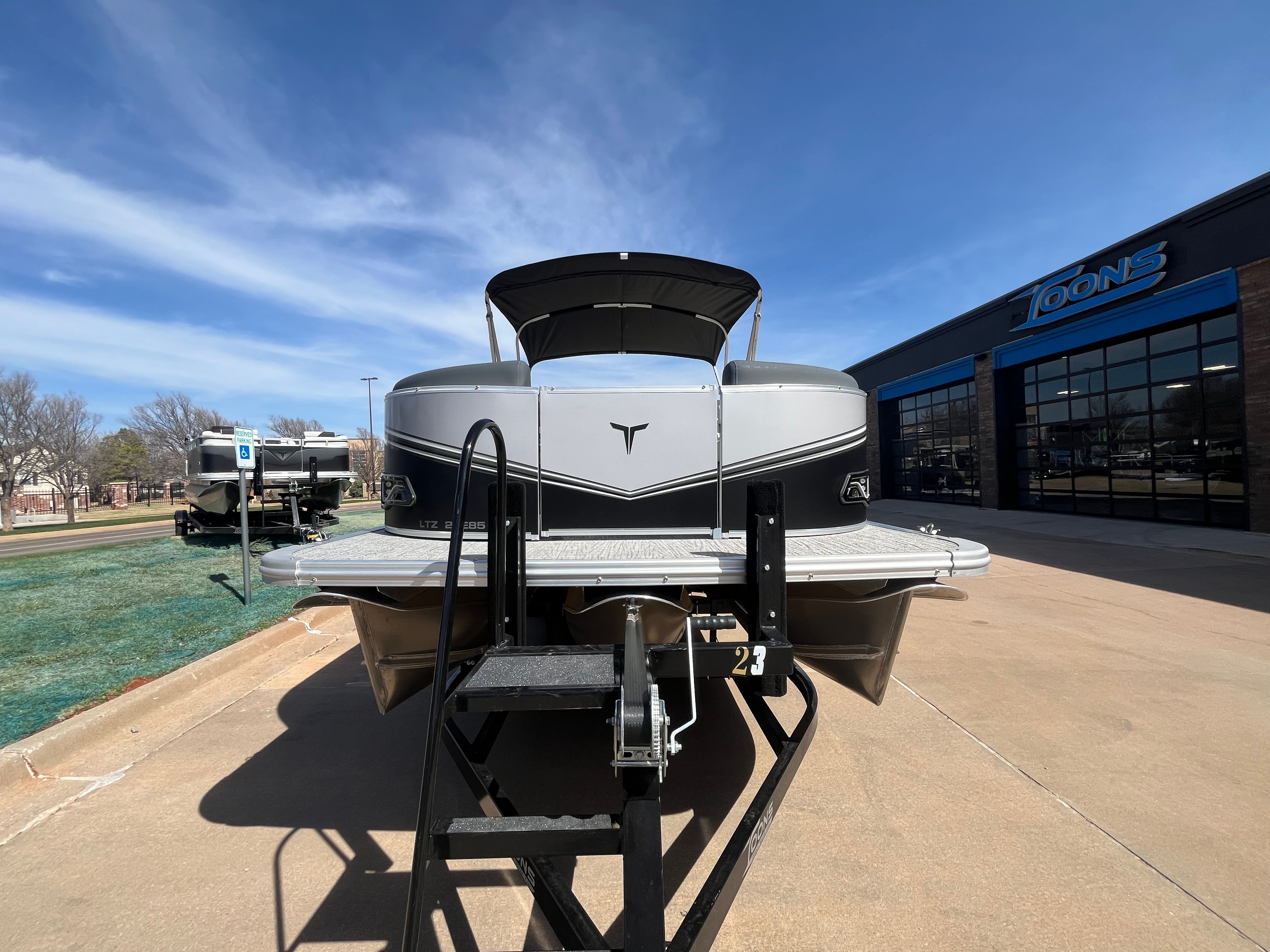2026 Tahoe 2385 LTZ Cruise pontoon boat on trailer.