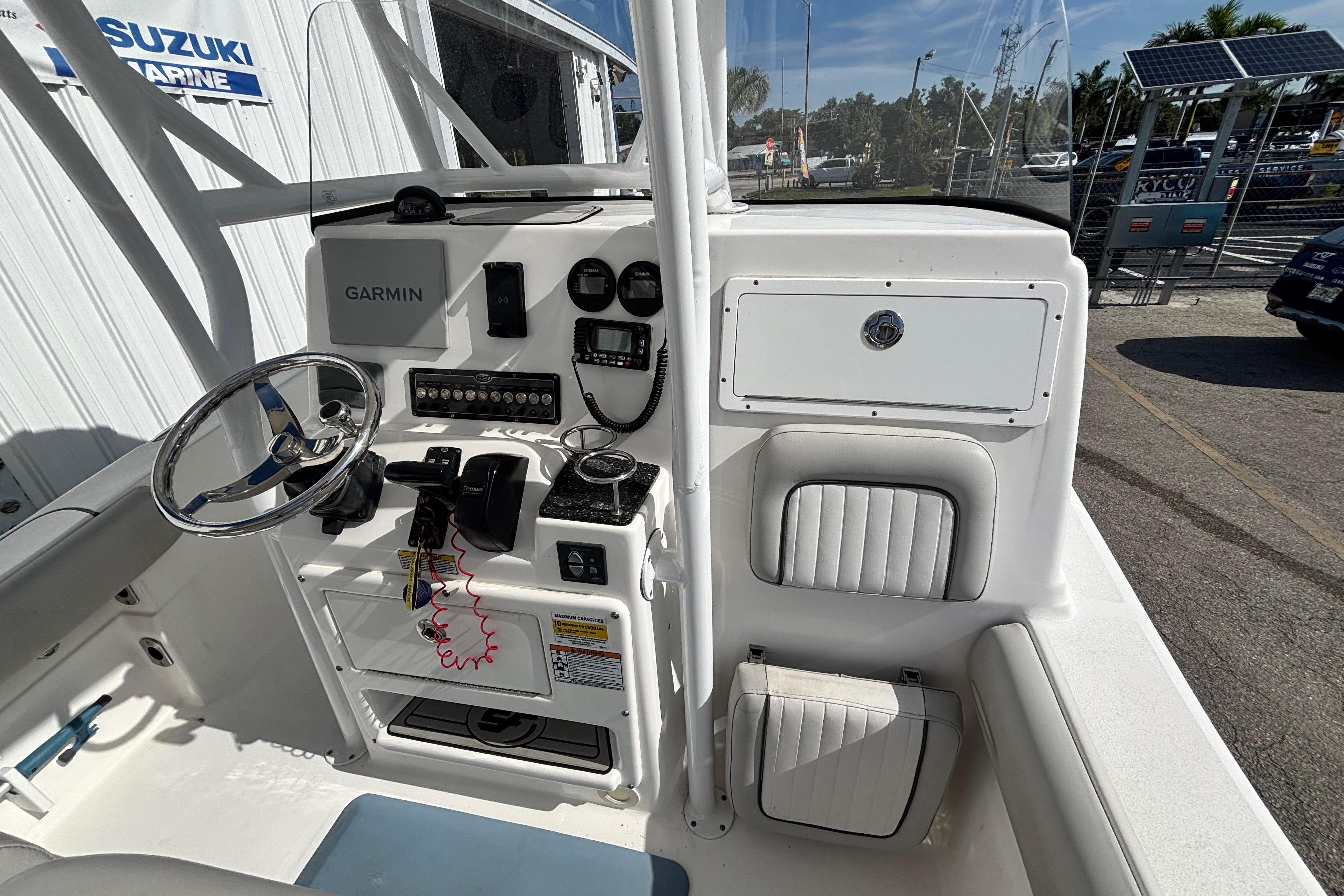 2021 Sea Fox 249 Avenger boat cockpit with Garmin navigation and control panel.