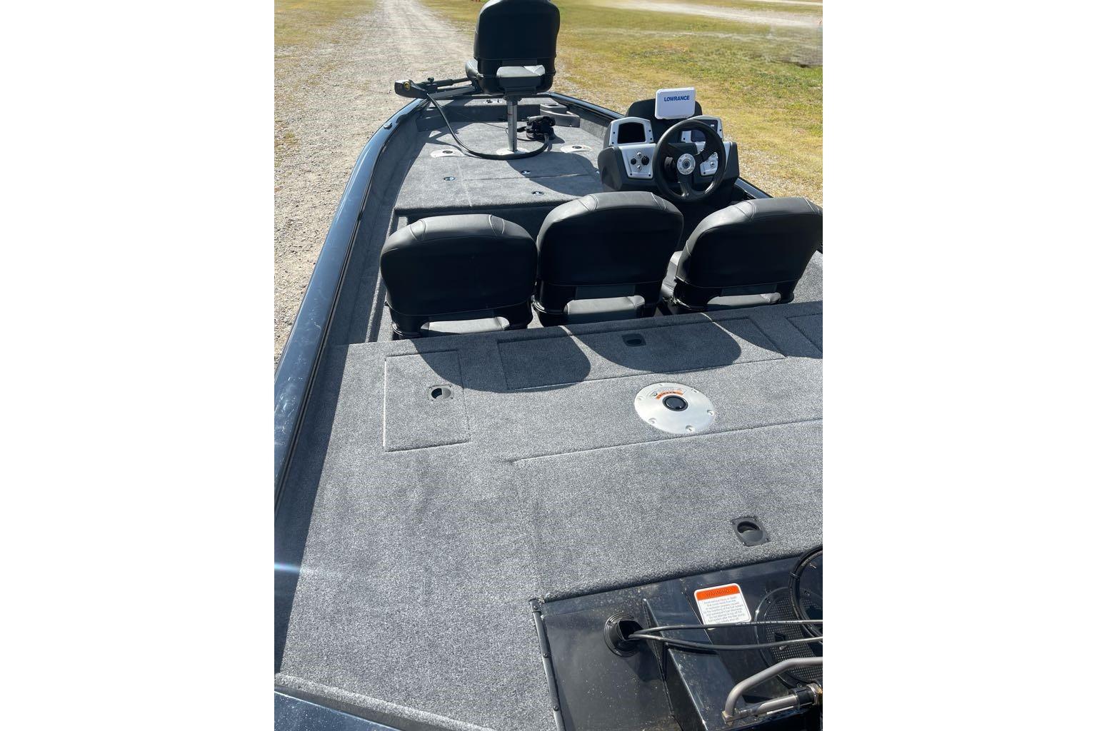 2026 Tracker Pro Team 175 Crappie Edition boat interior with seating and steering console.