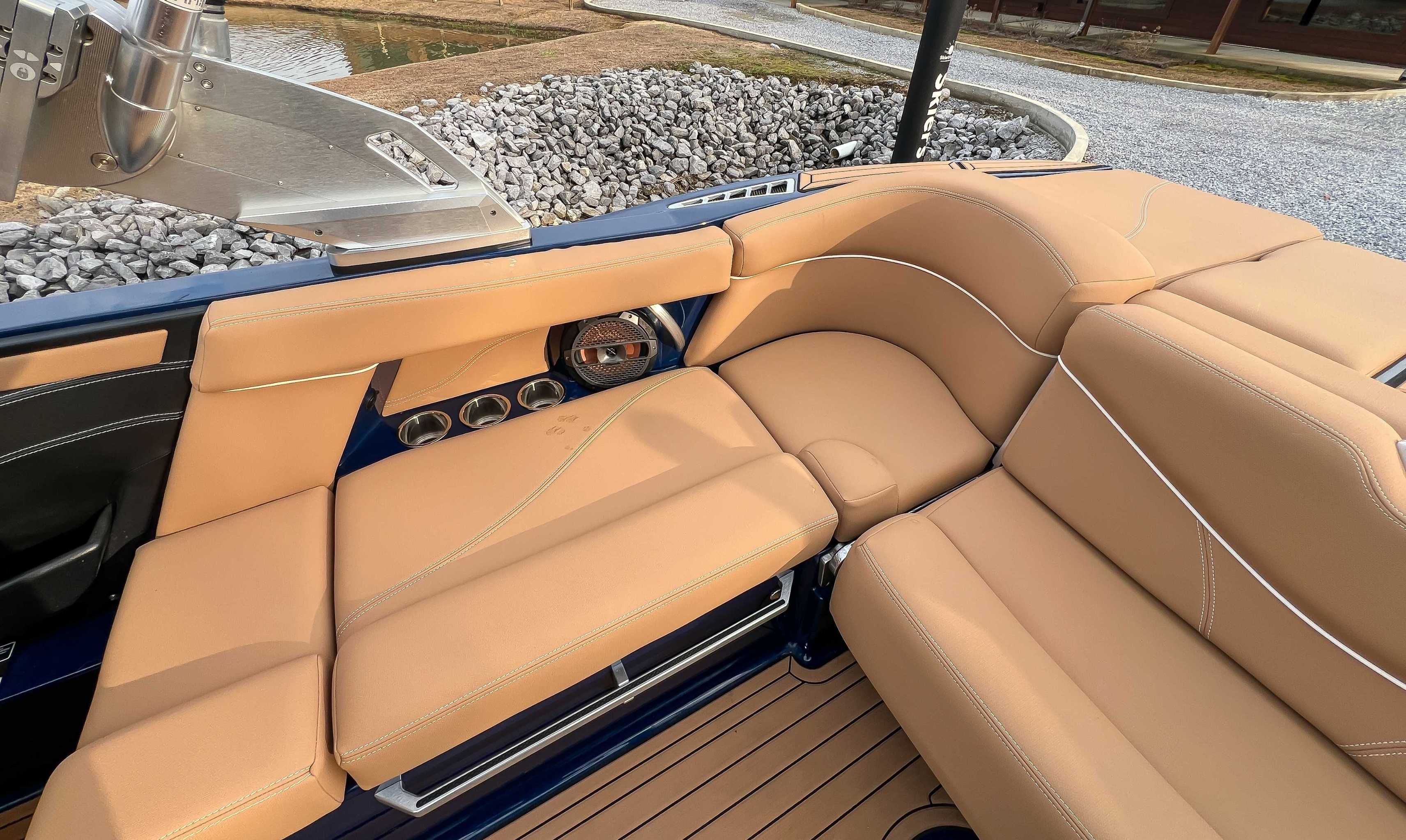 2021 MasterCraft XT22 boat with luxurious leather seating.