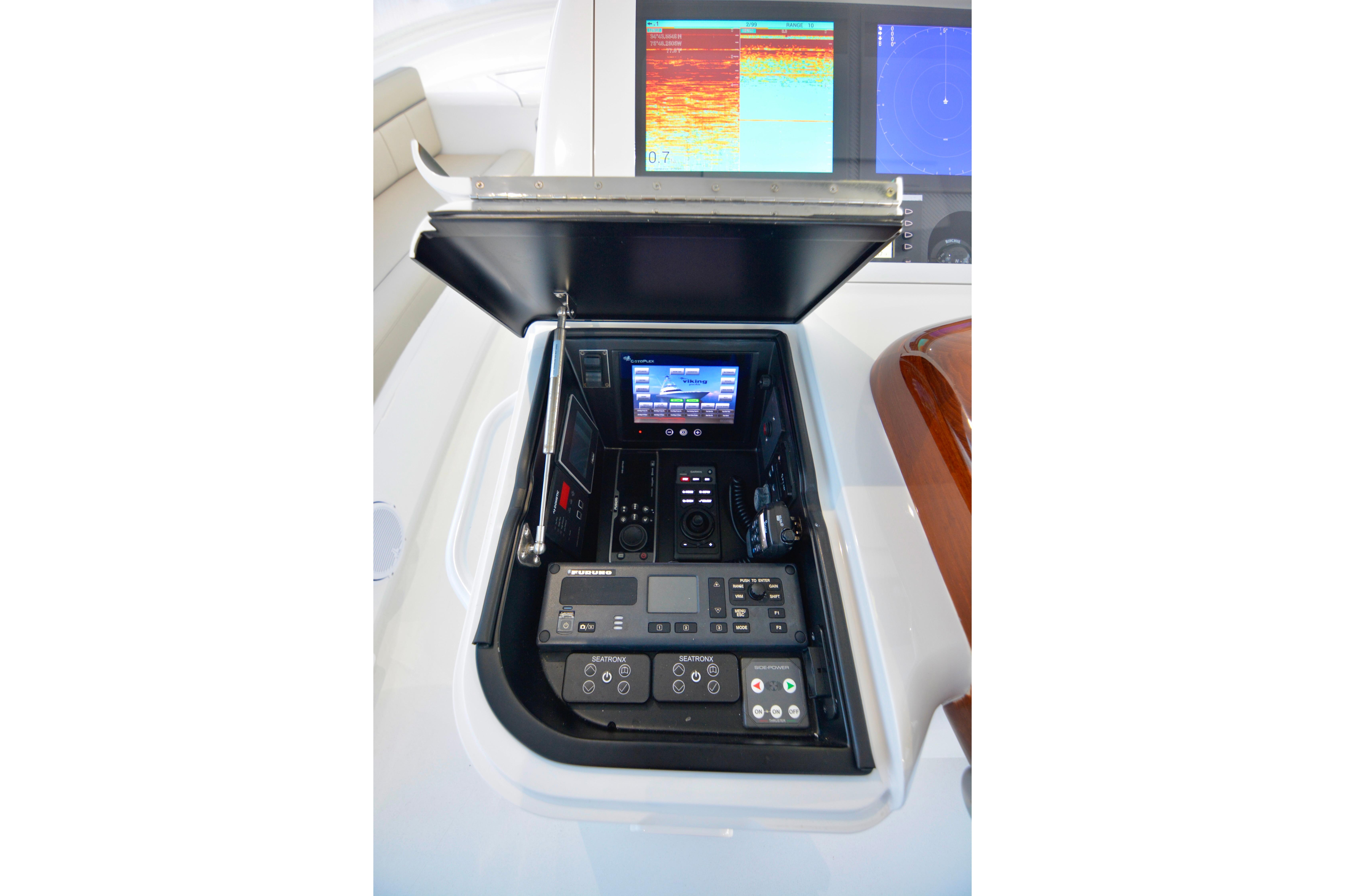2019 Viking 68 Convertible yacht control panel with advanced navigation displays.