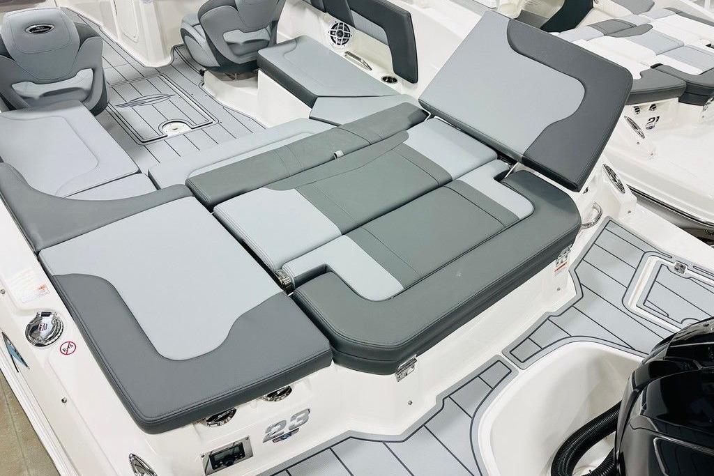 2025 Chaparral 23 SSi OB boat interior with gray seating and modern design.