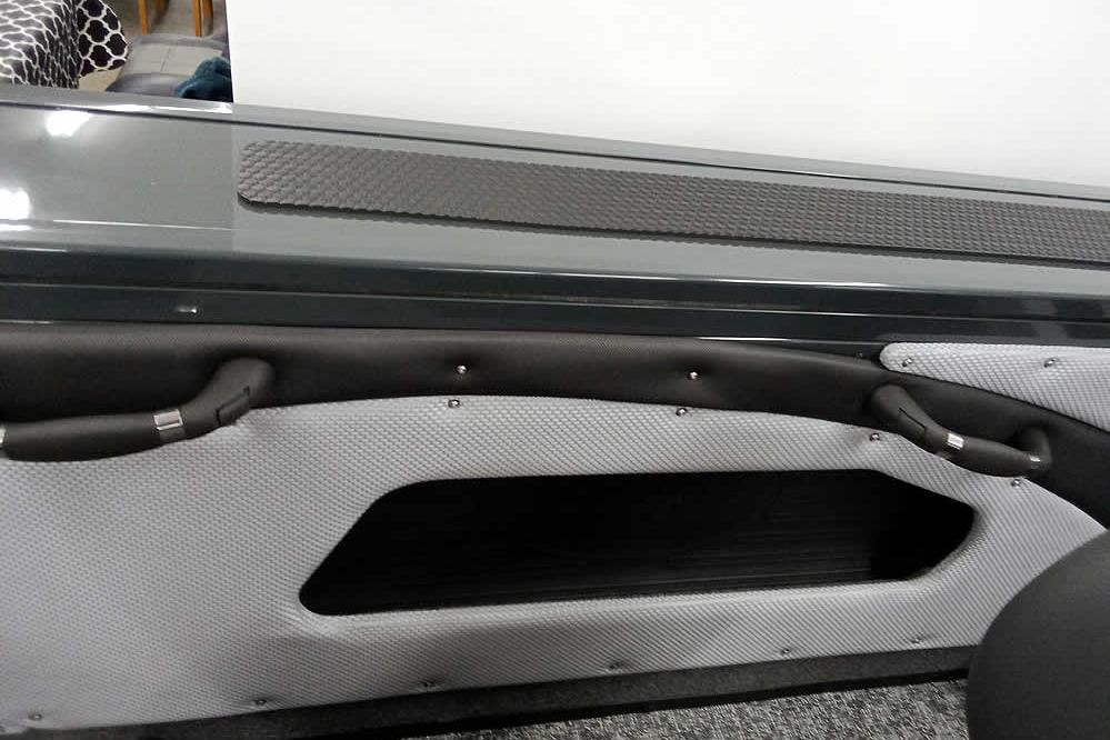 Interior detail of 2026 Ranger VX1888 WT boat, featuring sleek design and textured materials.