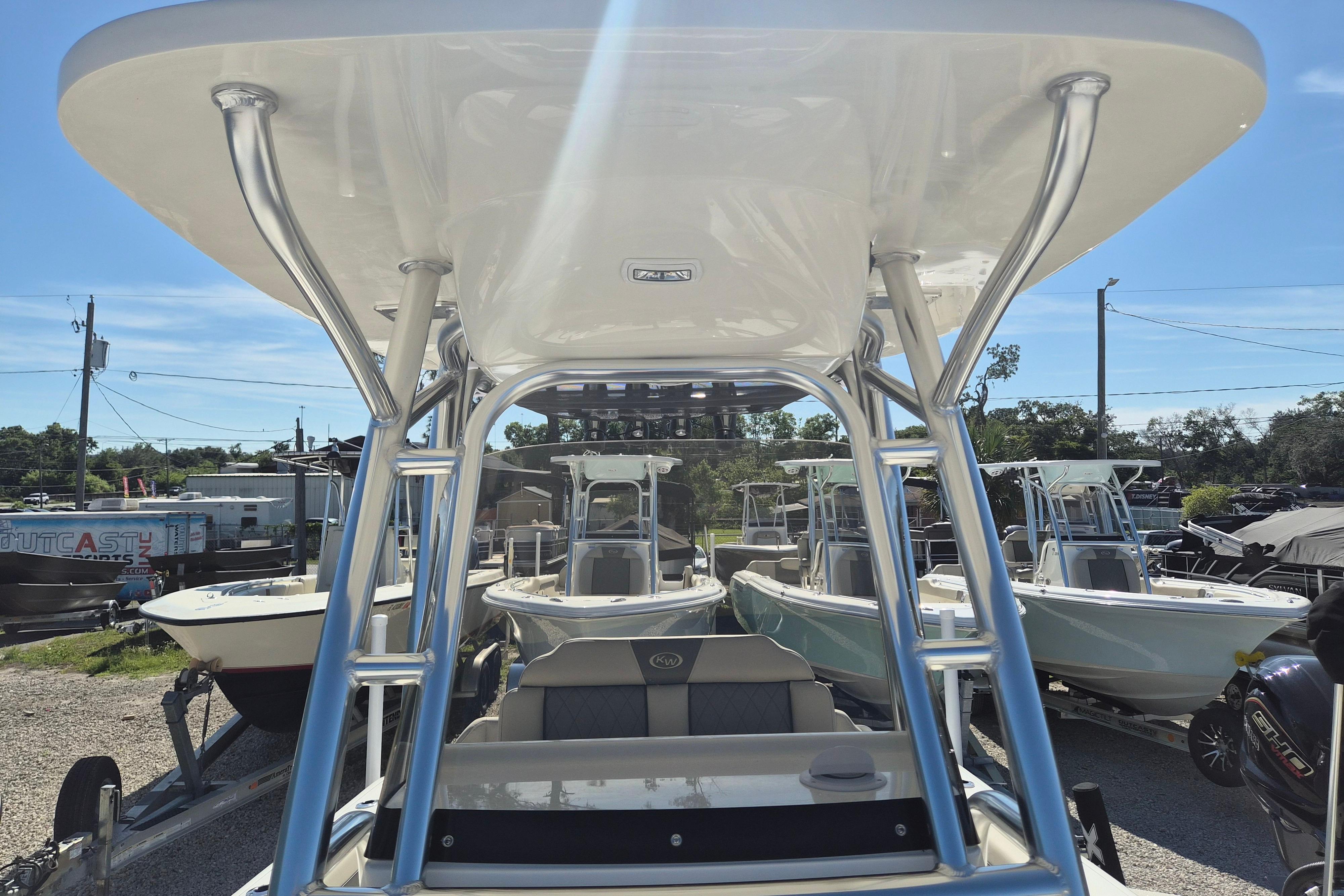 2026 Key West 239 FS boat displayed in a marina under clear blue skies.