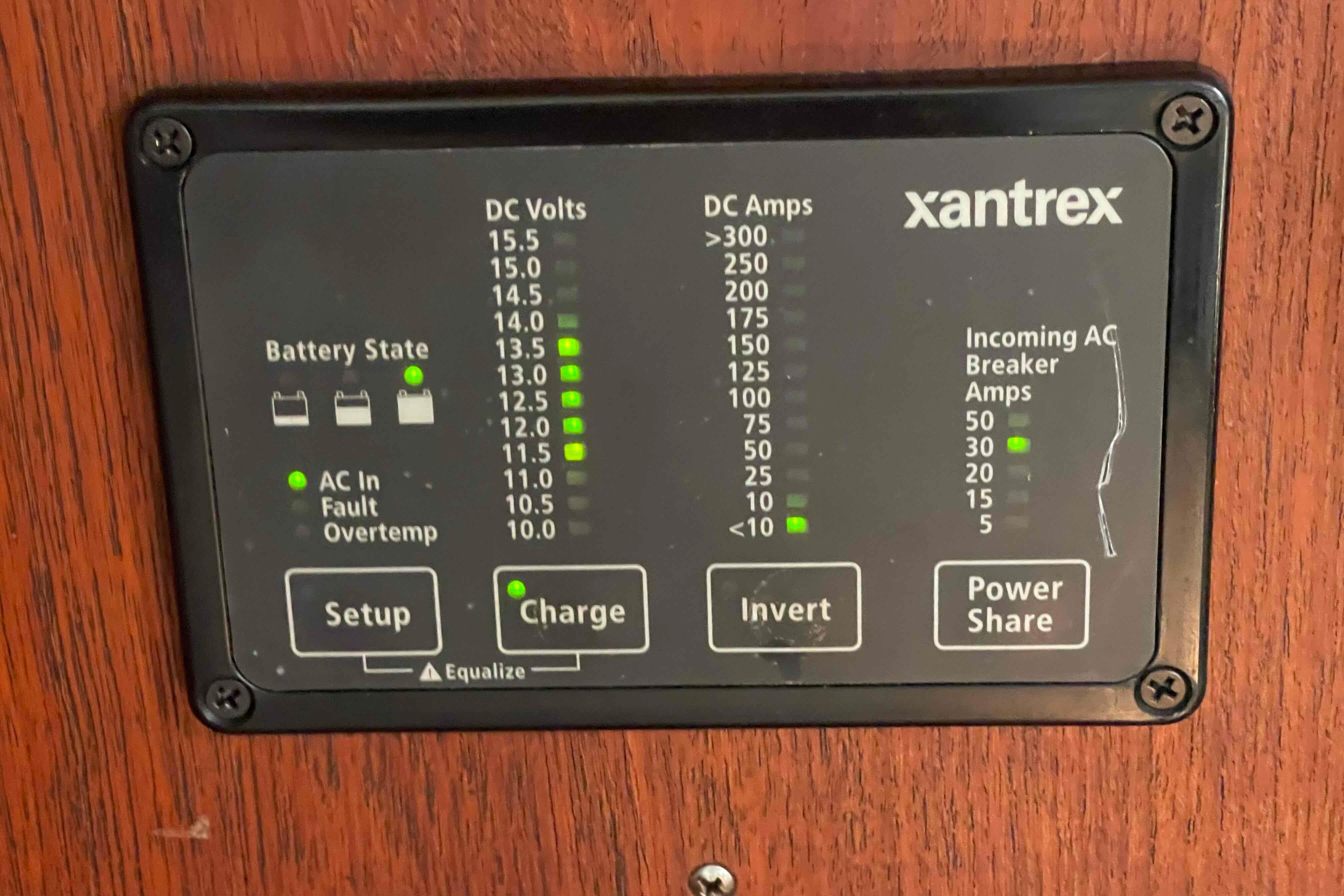 Control panel of a 1989 Island Packet 35 sailboat with Xantrex battery monitor.