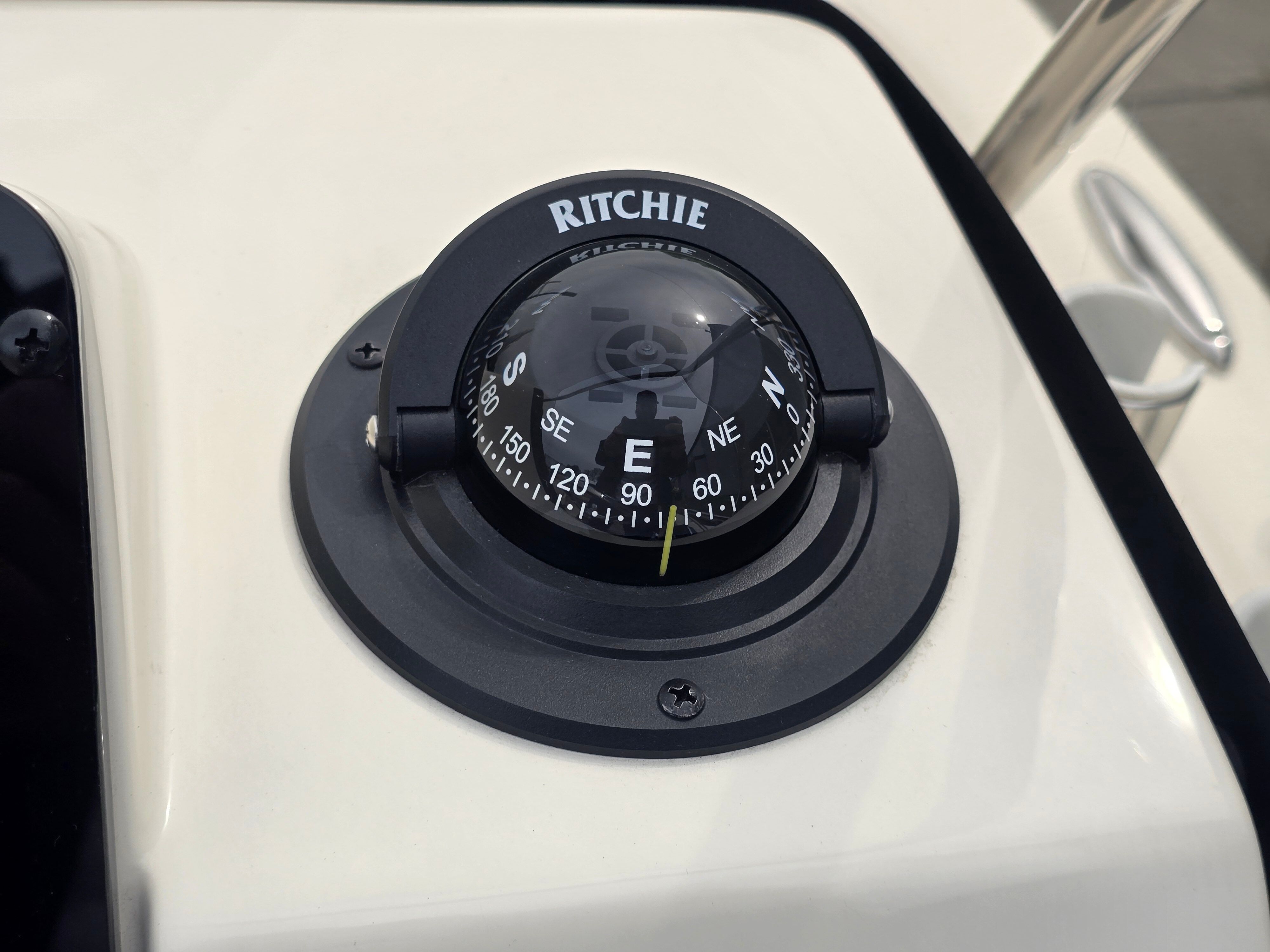 Compass on a boat with Ritchie branding.