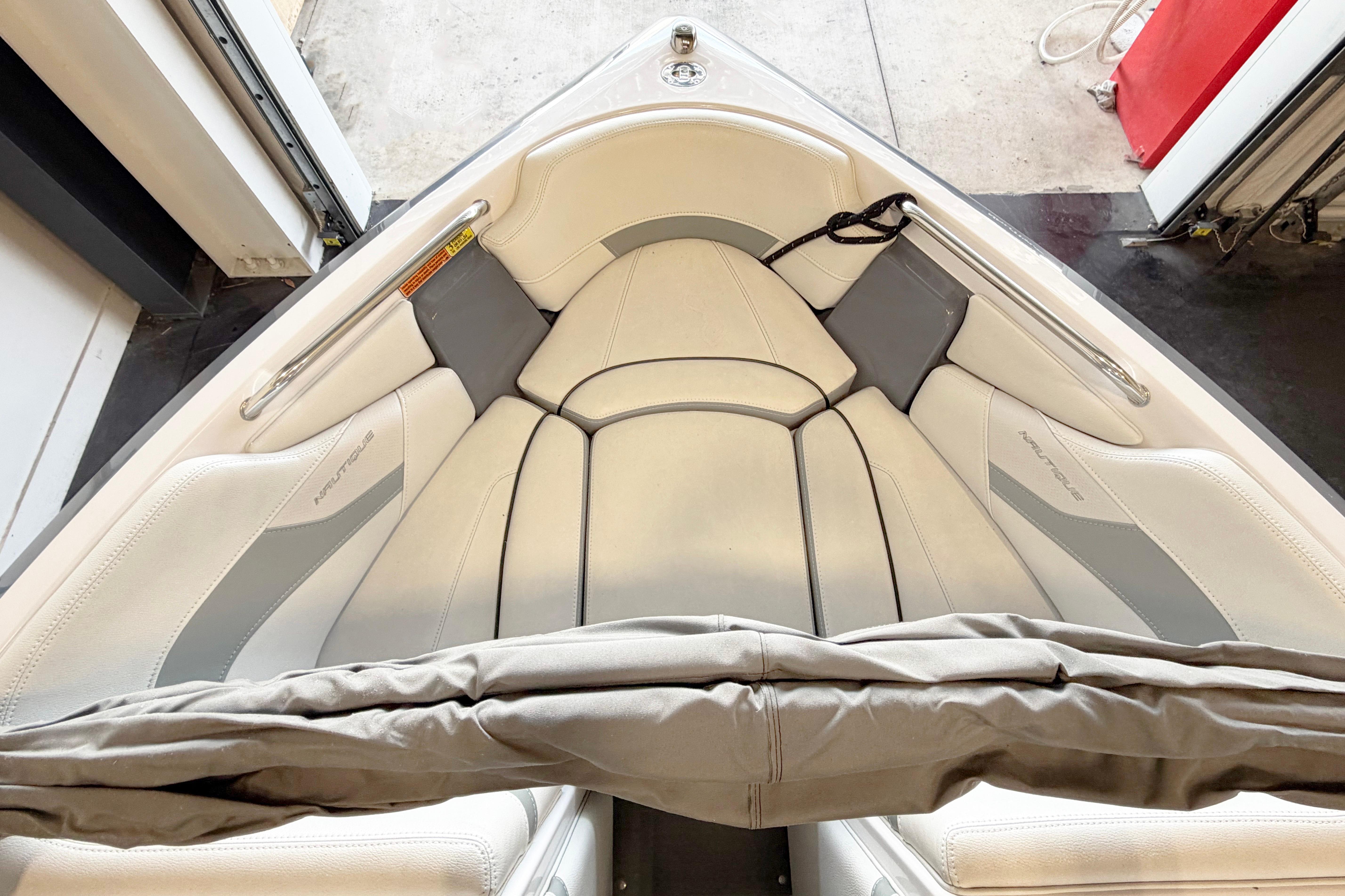 2014 Nautique Ski Nautique 200 Open Bow interior with white and gray seating.