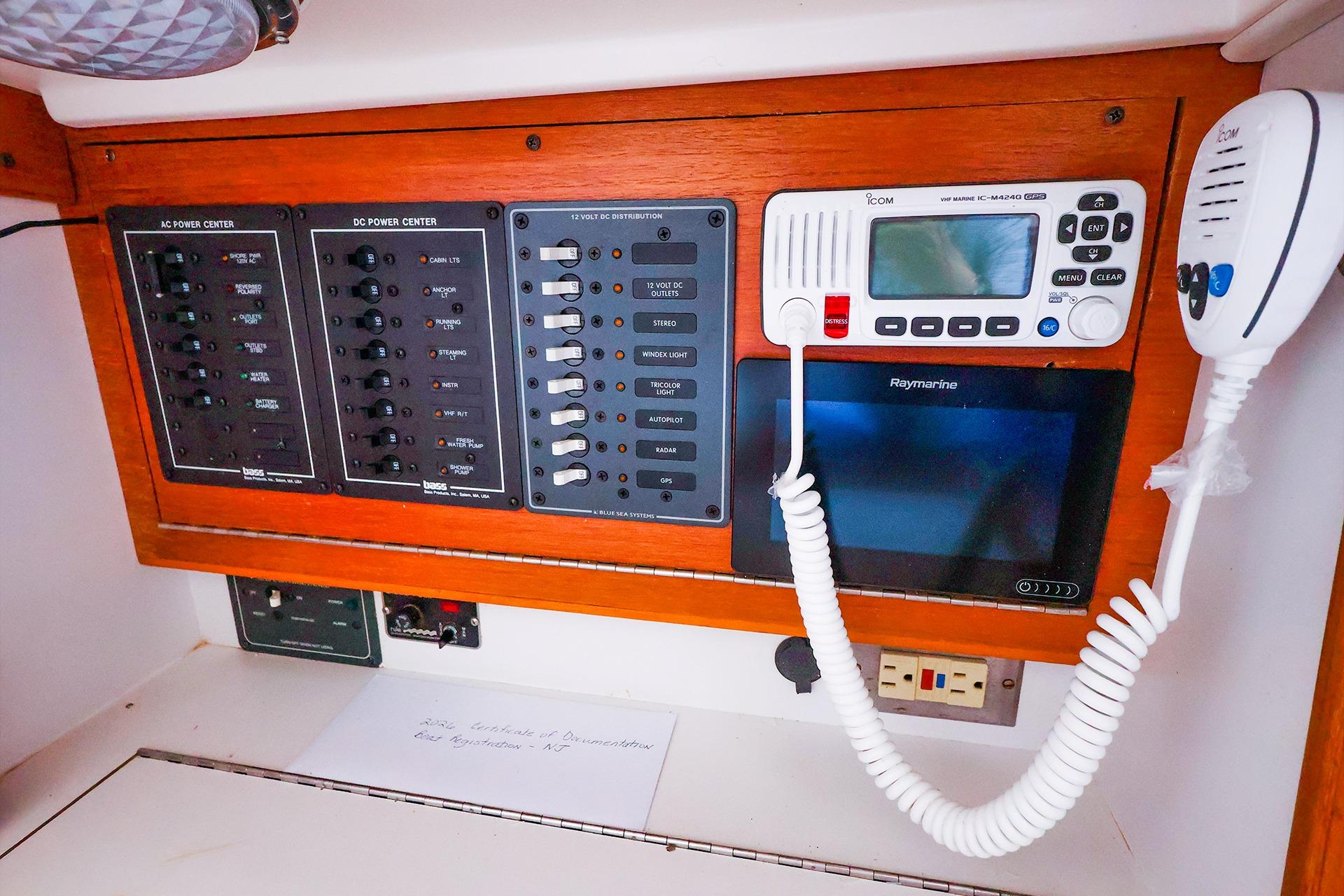 Control panel of a 2001 J Boats J/32 sailboat with navigation and communication equipment.