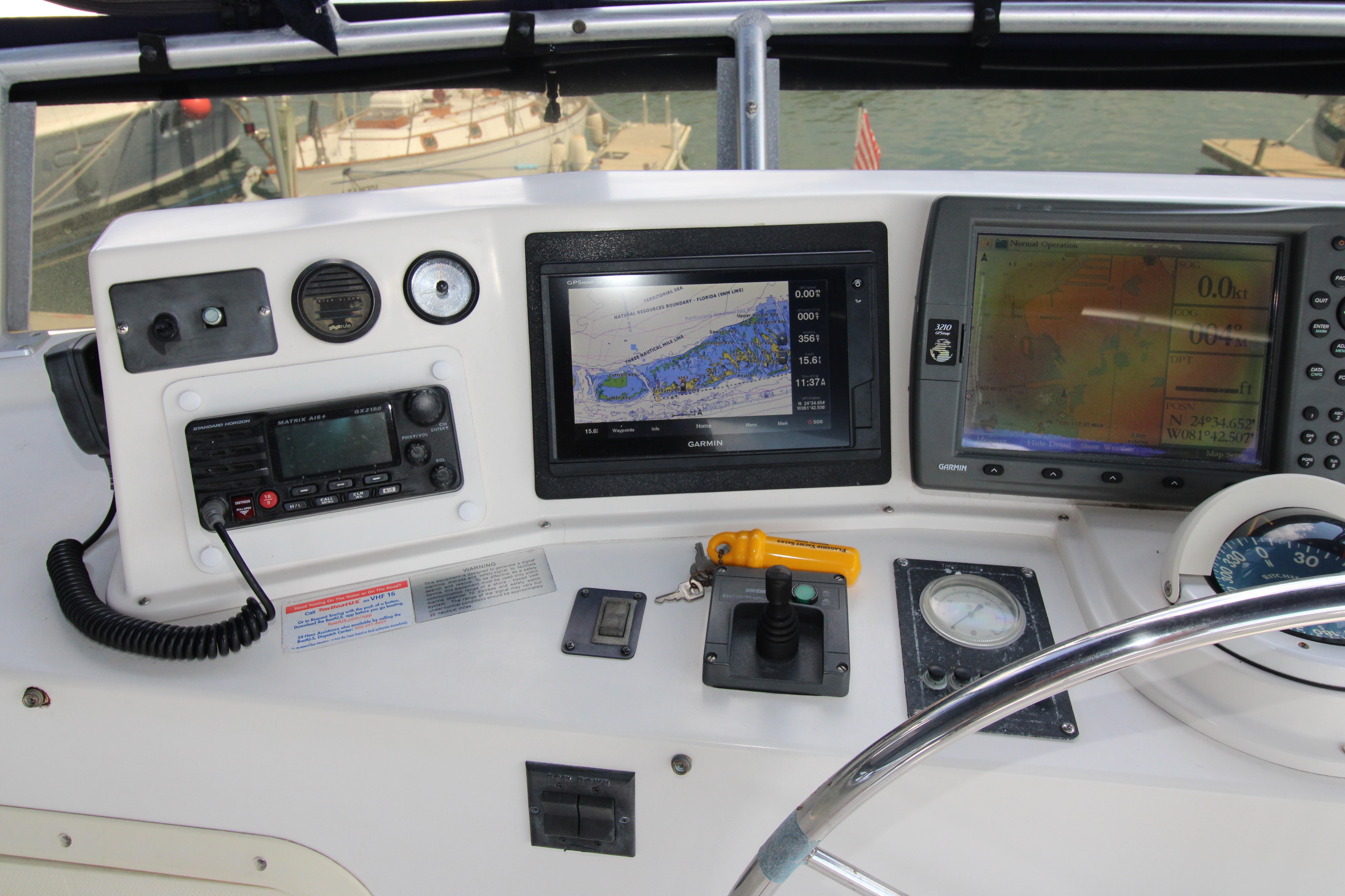 Control panel of a 2000 Ricker 42 Classic boat with navigation equipment.