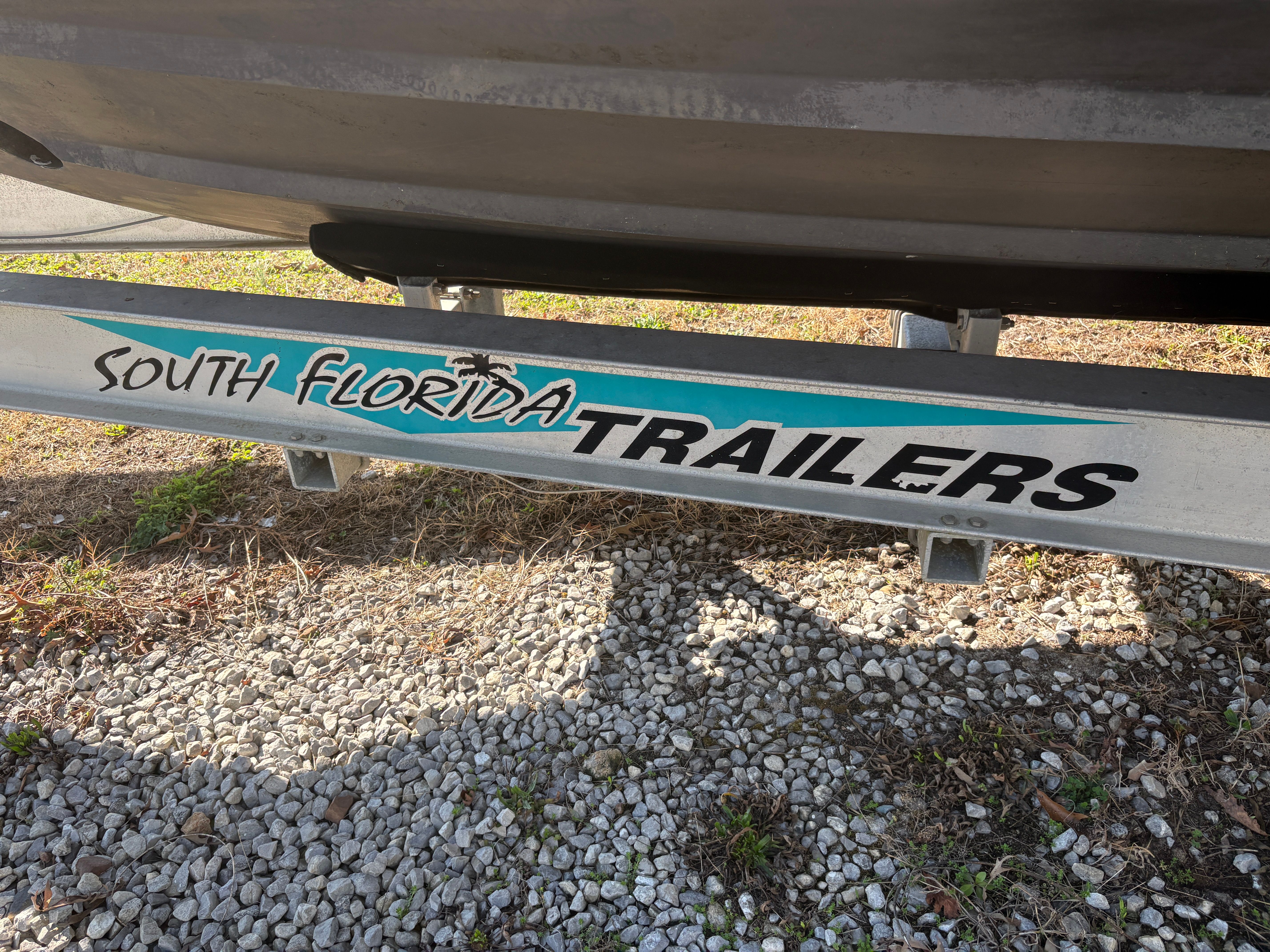South Florida Trailers with Intrepid 322 Cuddy Center Console boat.