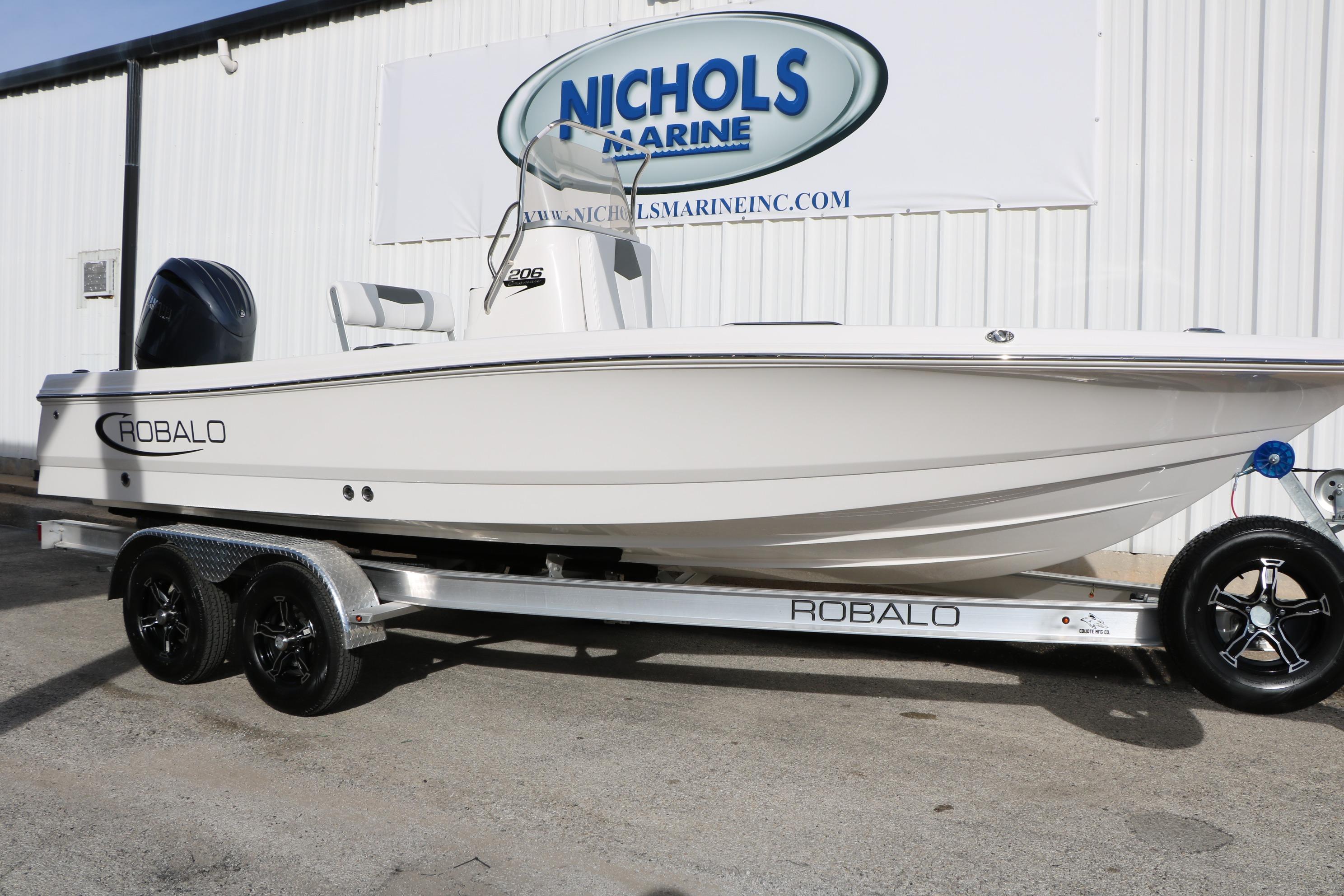 2026 Robalo 206 Cayman boat on trailer at Nichols Marine dealership.
