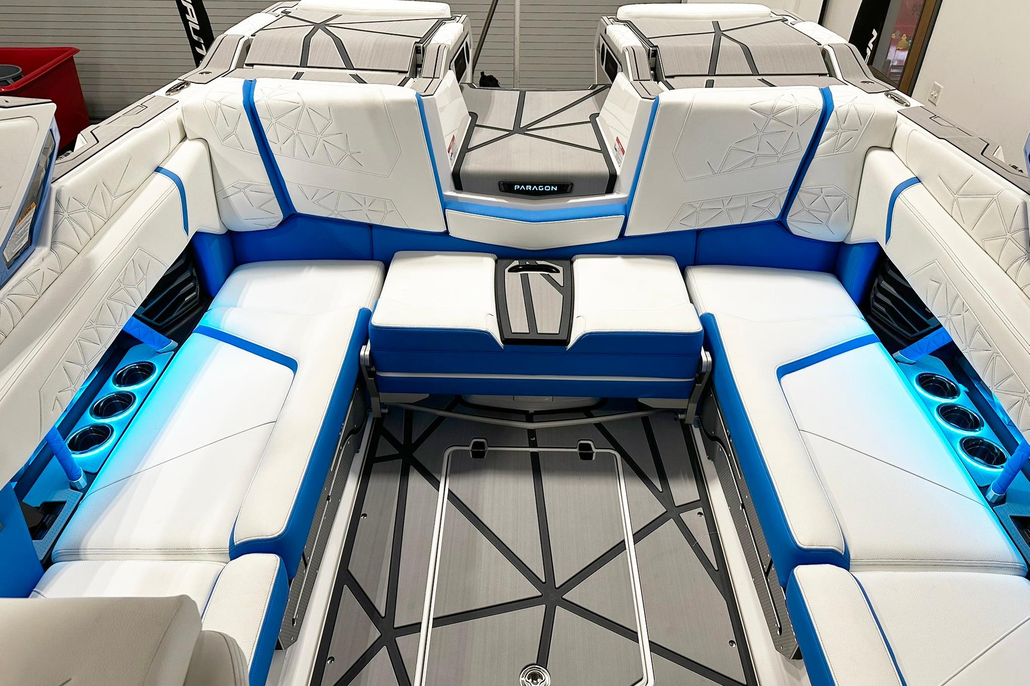 2025 Nautique Super Air Nautique G23 Paragon interior with blue and white seating.