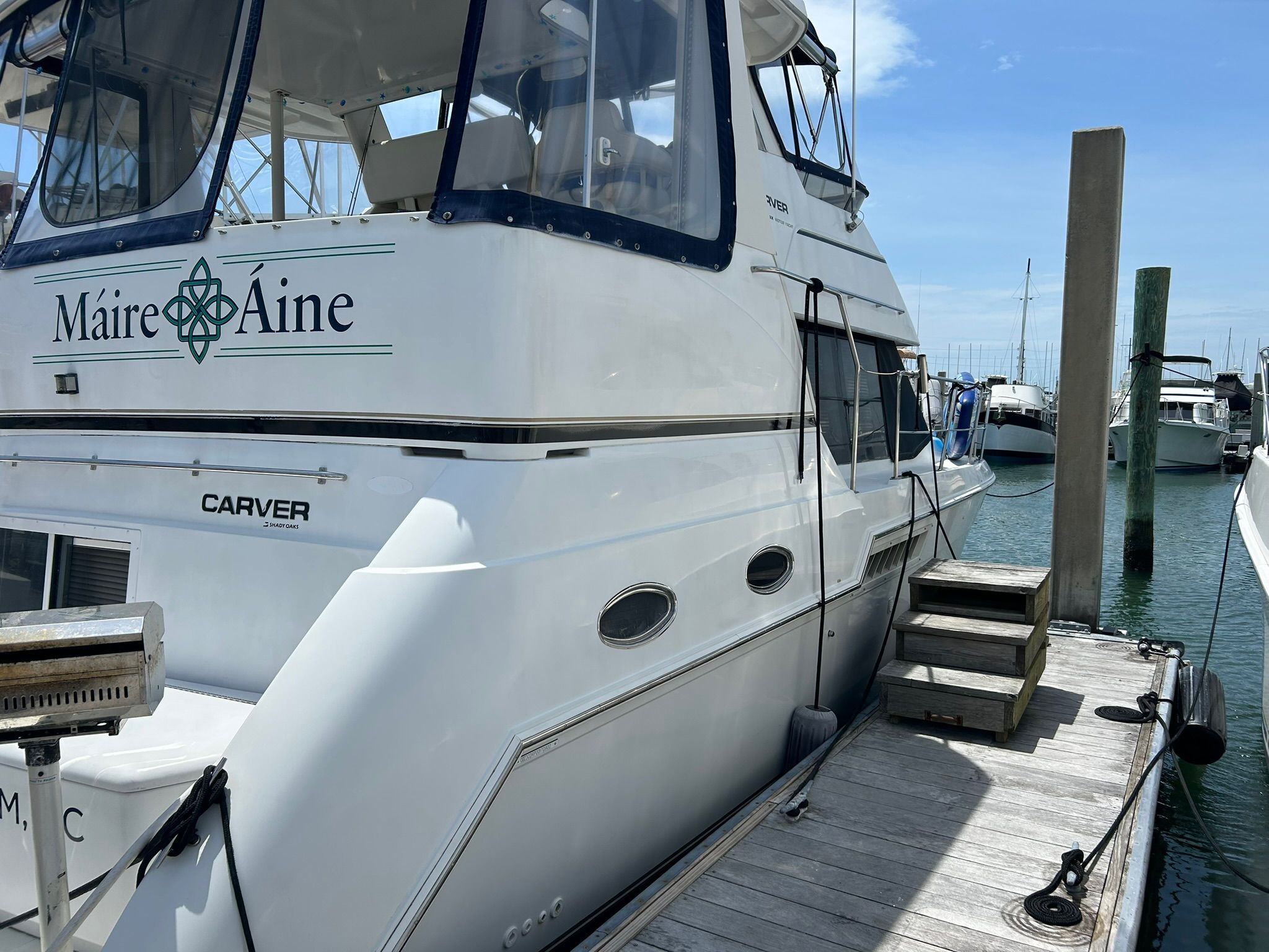 2000 Carver 356 Aft Cabin Motor Yacht docked at marina.