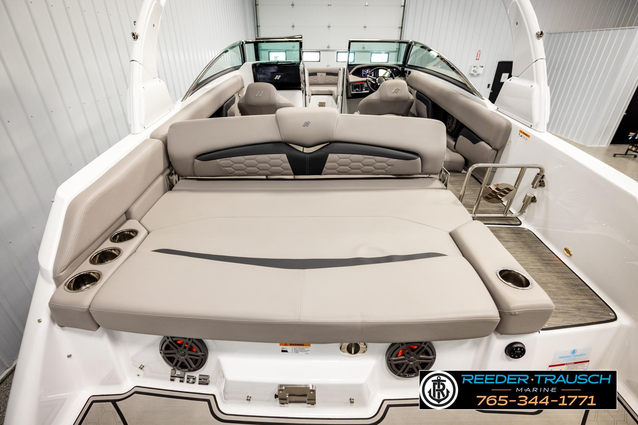 2024 FOURWINNS HD5 Surf boat interior with spacious seating and modern design.