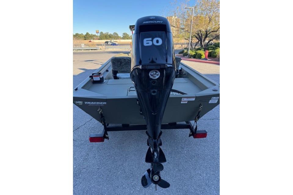 2026 Tracker Grizzly 1754 SC boat with Mercury 60 outboard motor, rear view.
