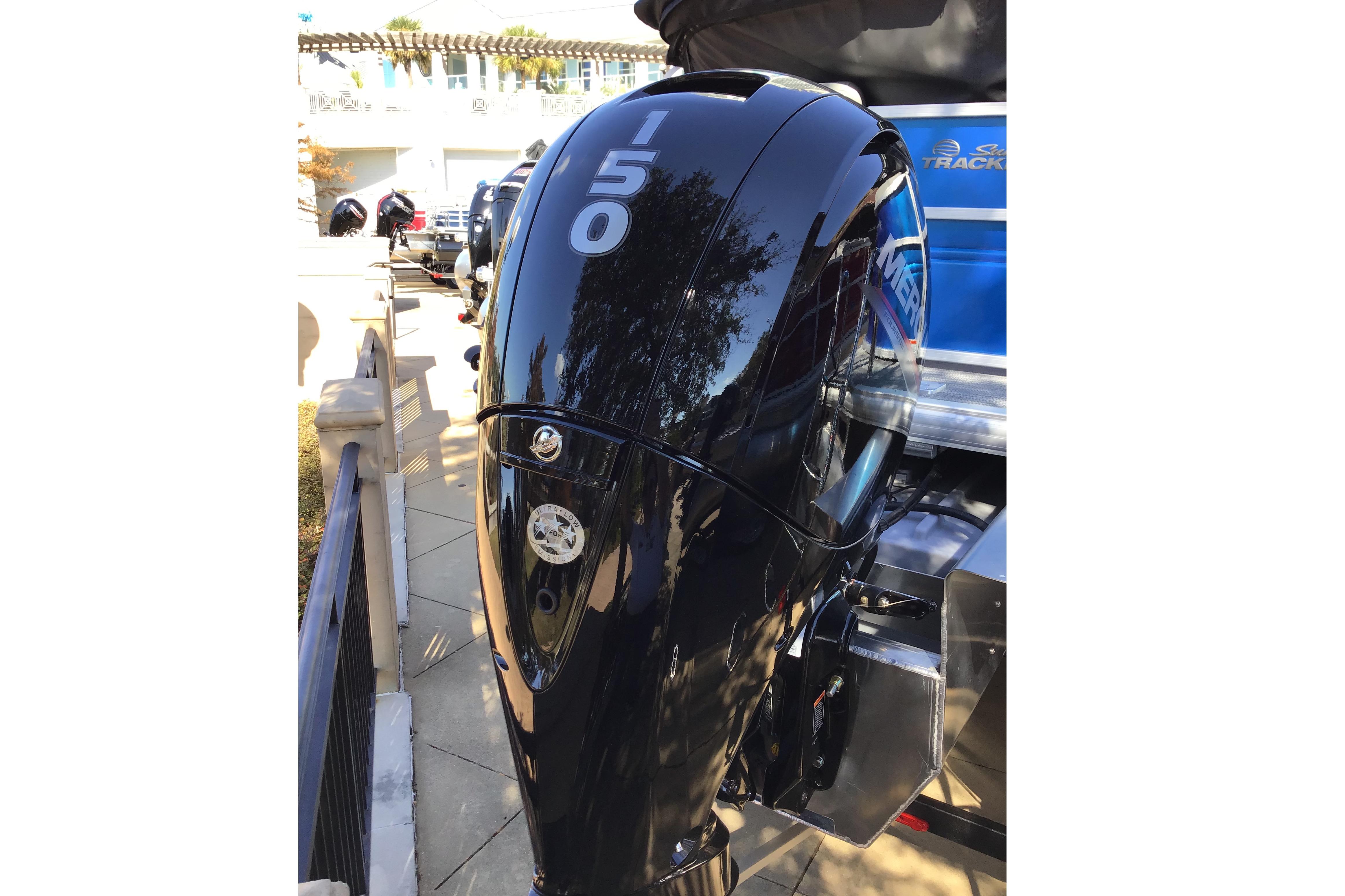 2026 Sun Tracker Party Barge 22 XP3 with a 150 HP outboard motor.