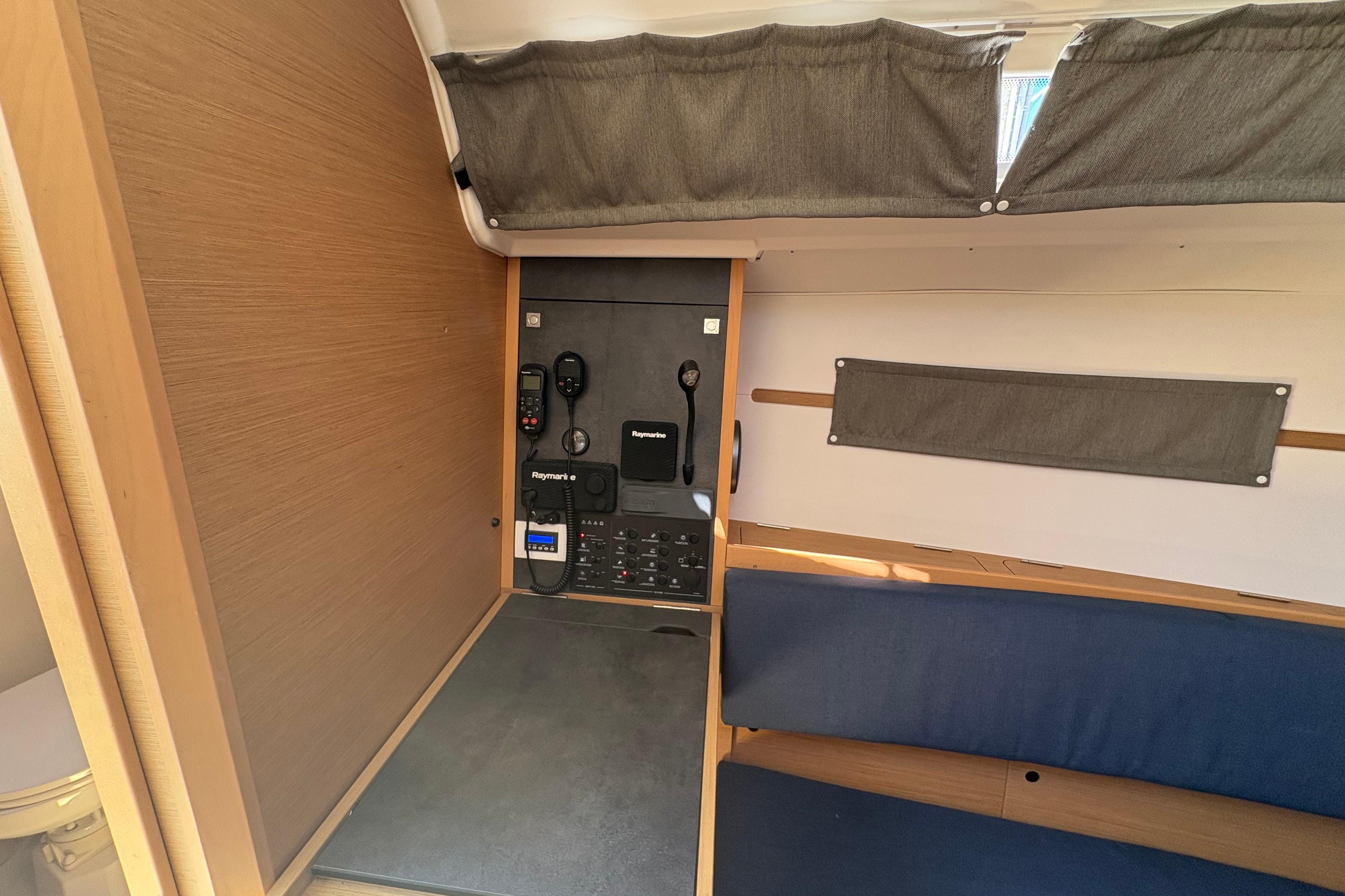 Interior of 2021 Jeanneau Sun Odyssey 349 sailboat with navigation equipment.