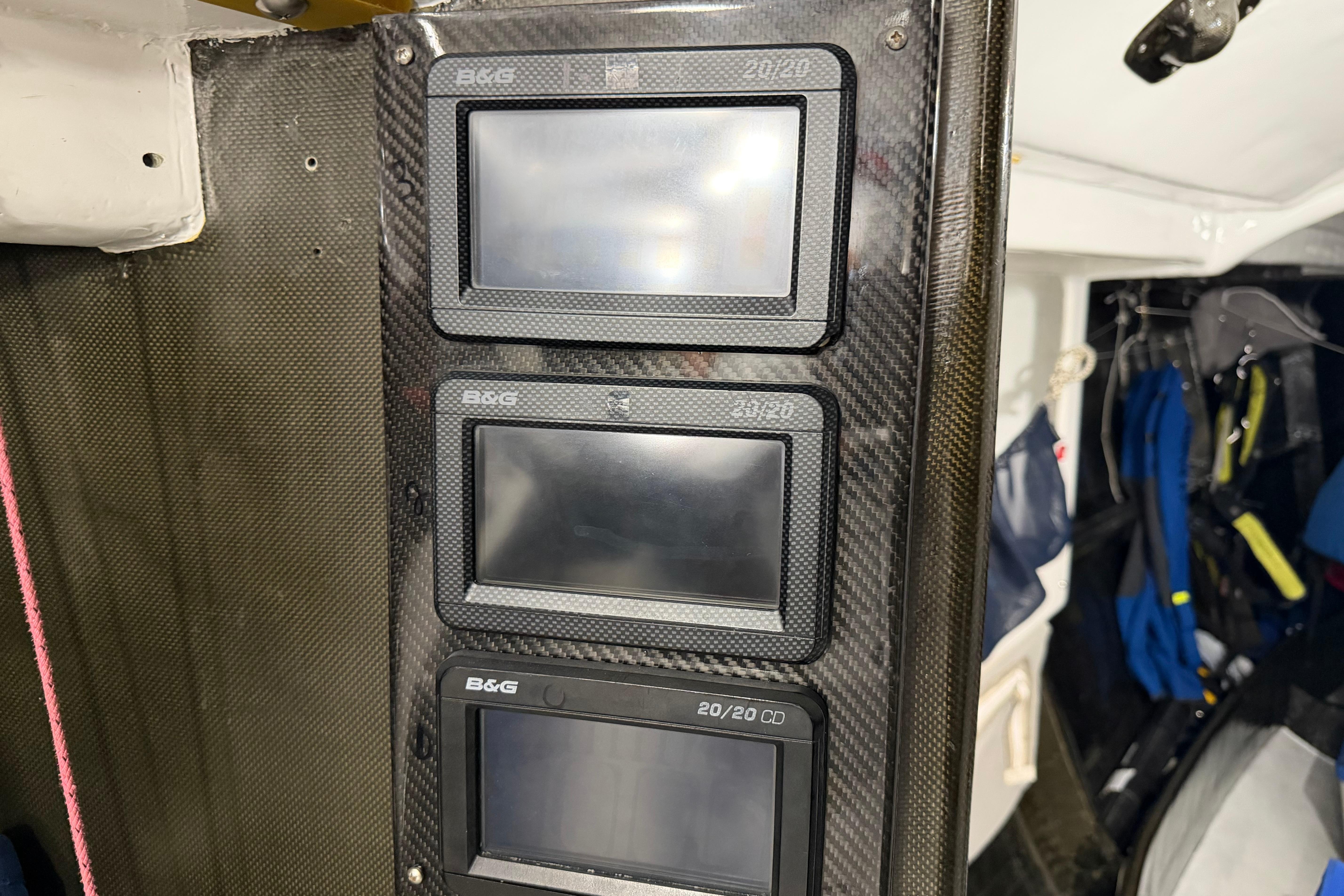 Carbon fiber panel with three B&G marine displays on an Andrews 63 yacht.
