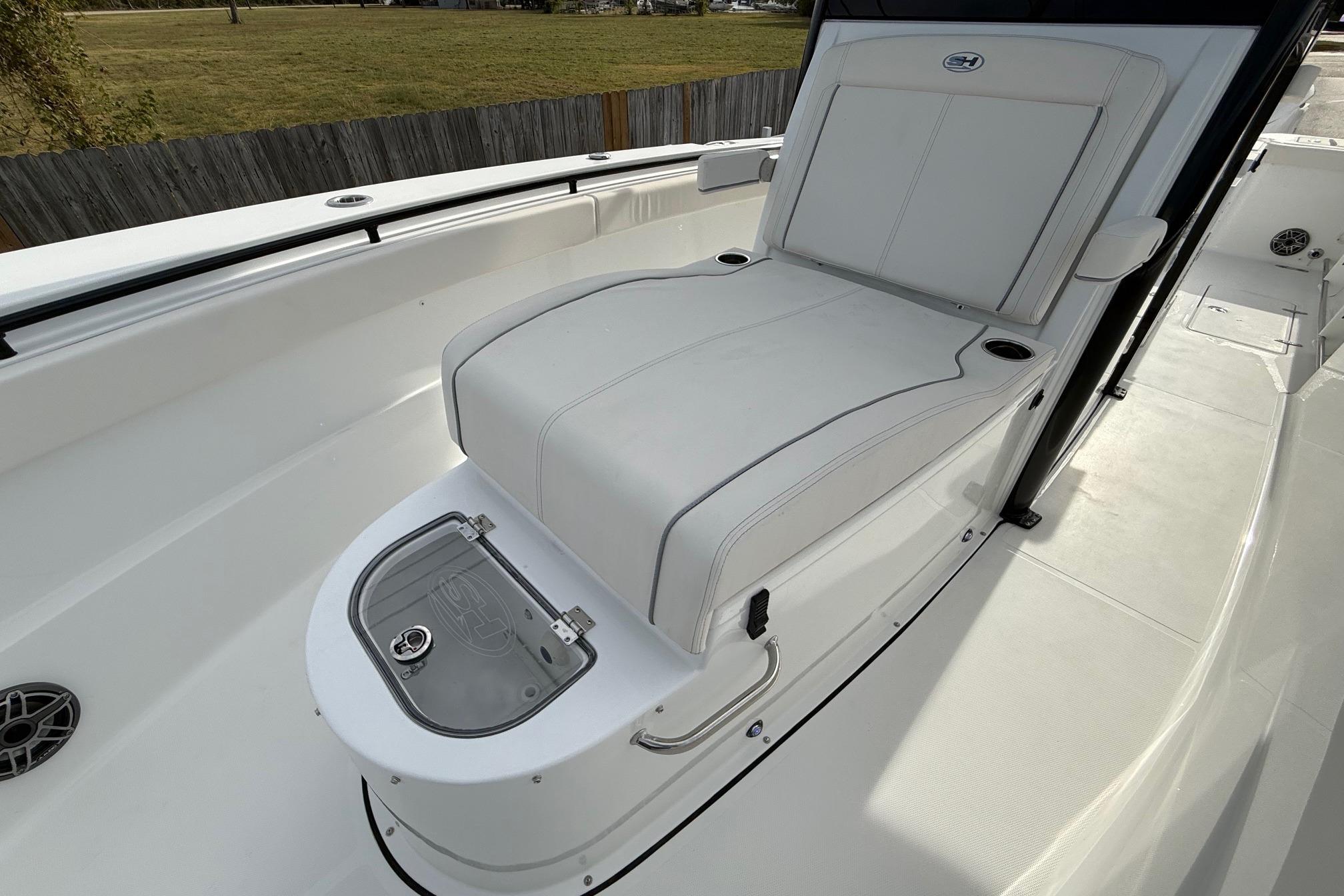 2026 Sea Hunt Gamefish 30 Coffin Box boat interior with cushioned seating.