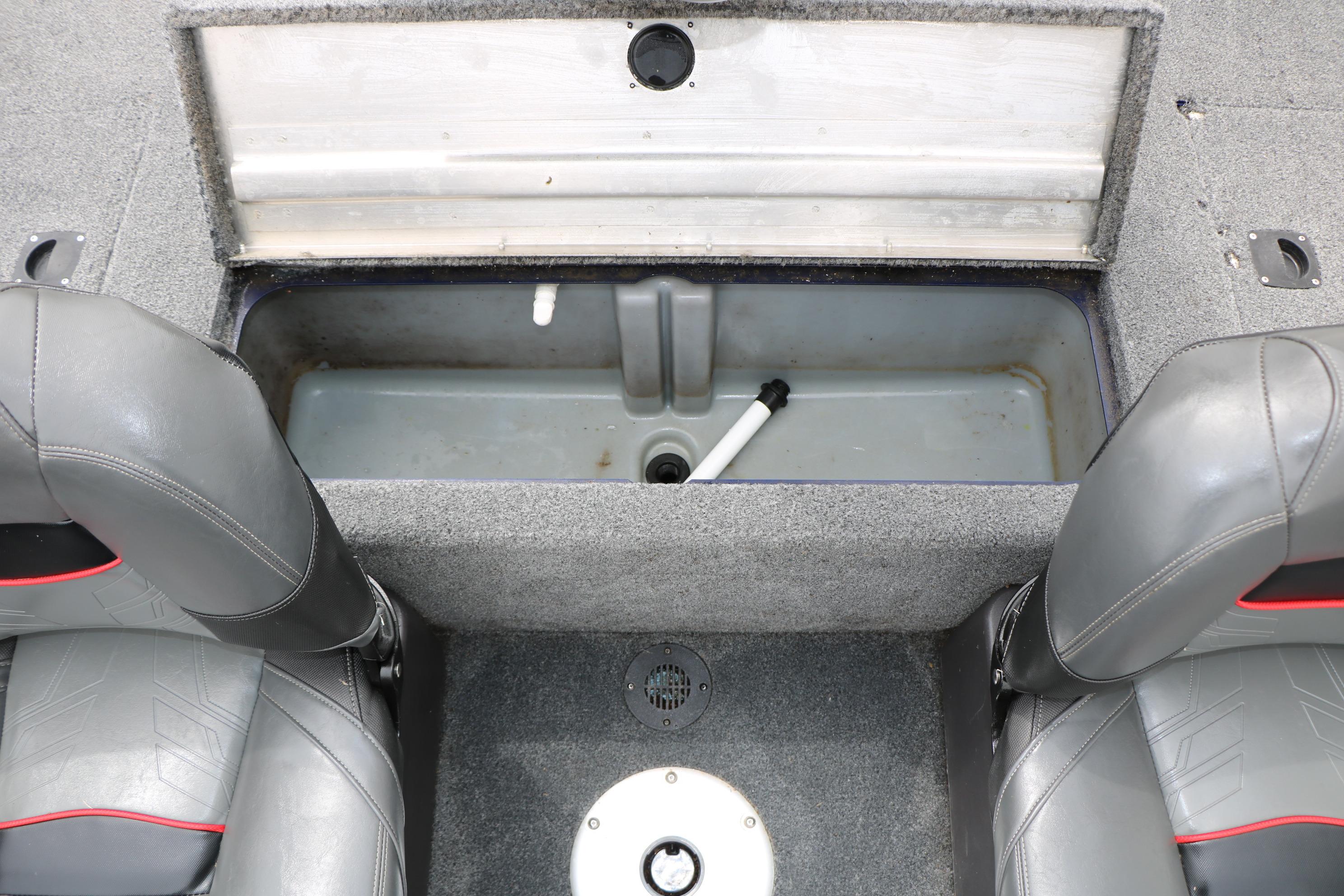 2022 Tracker Pro Team 175 TF boat interior with open storage compartment.