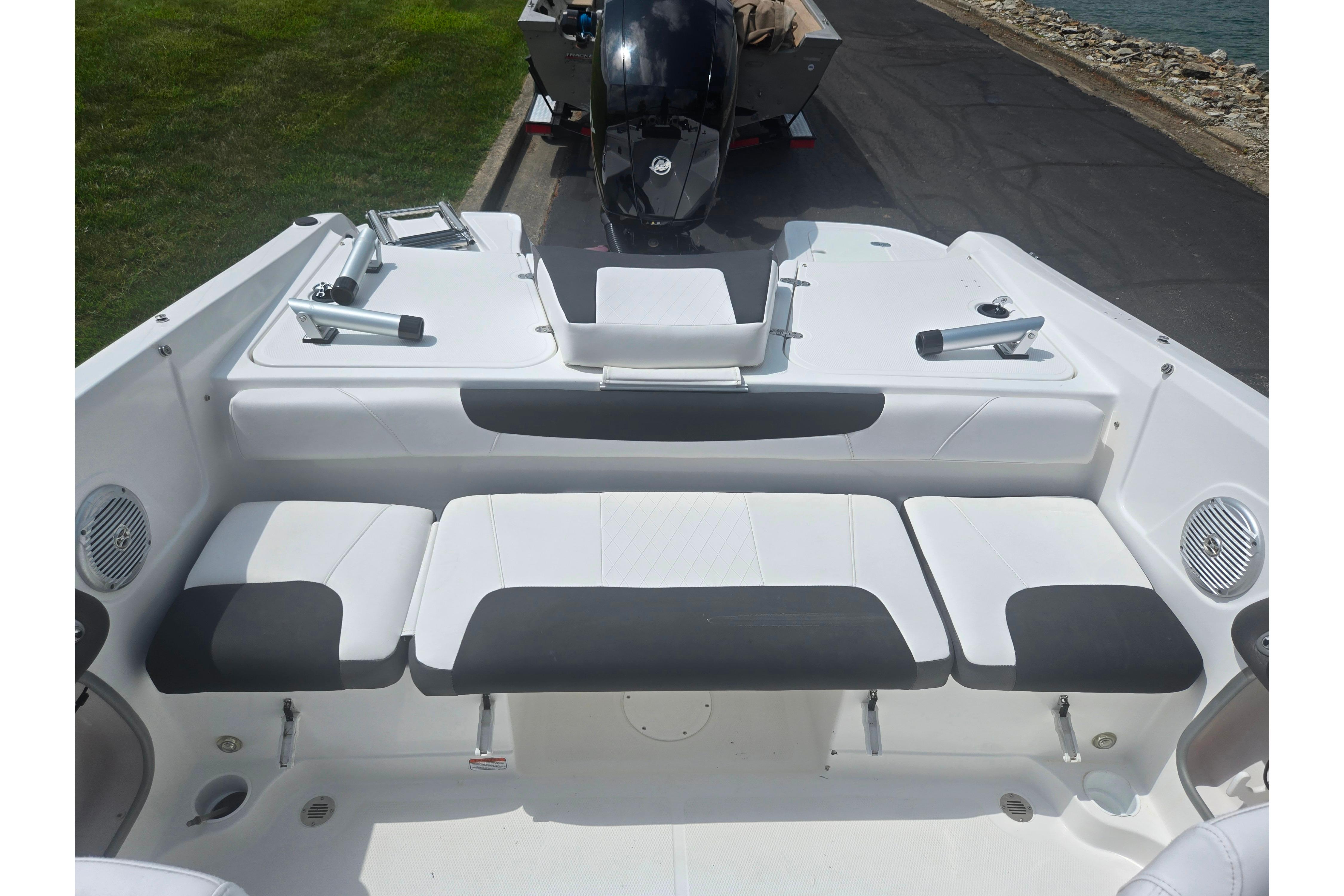 2023 Tahoe 200 S boat interior with cushioned seating and sleek design.