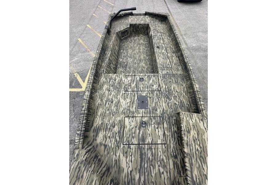 2026 SeaArk 1752 Slayer X boat with camouflage pattern, viewed from above.