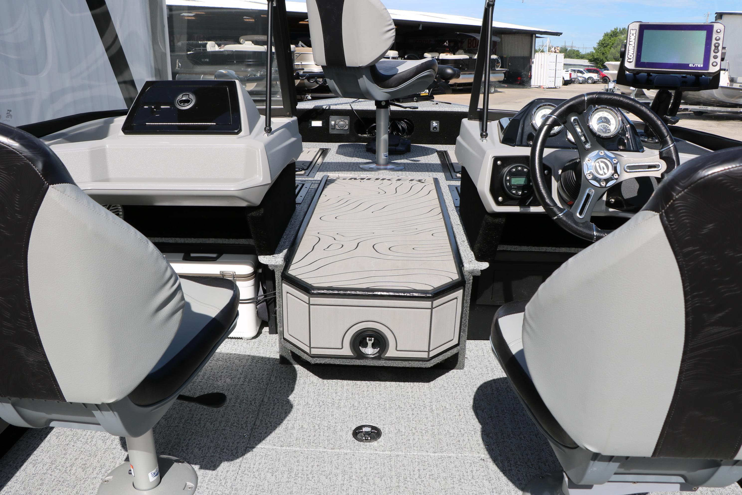 2025 Smoker Craft Adventurer 188 DC boat interior with modern dashboard and seating.