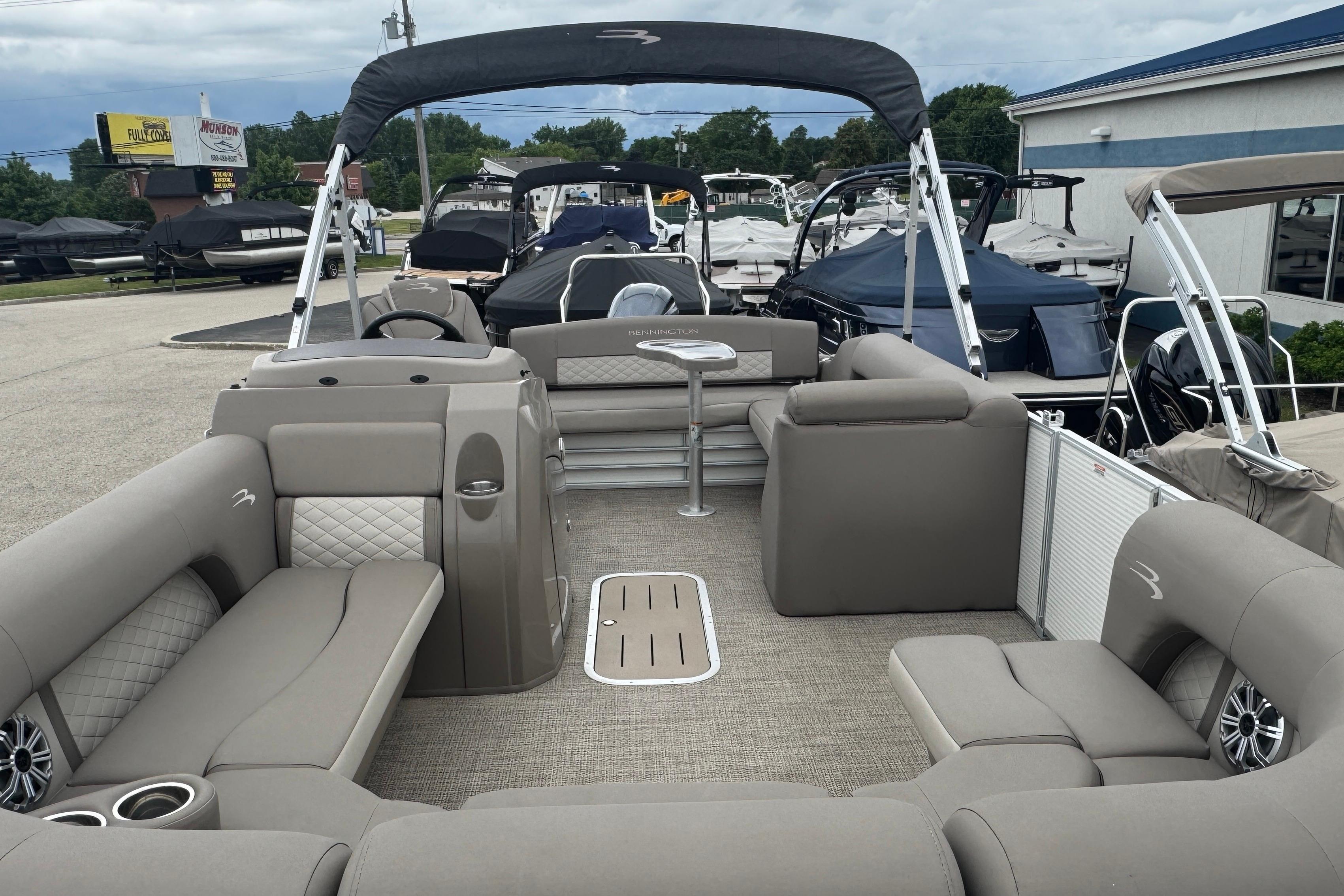 2019 Bennington SX 22 SSBXP pontoon boat with spacious seating and modern design.
