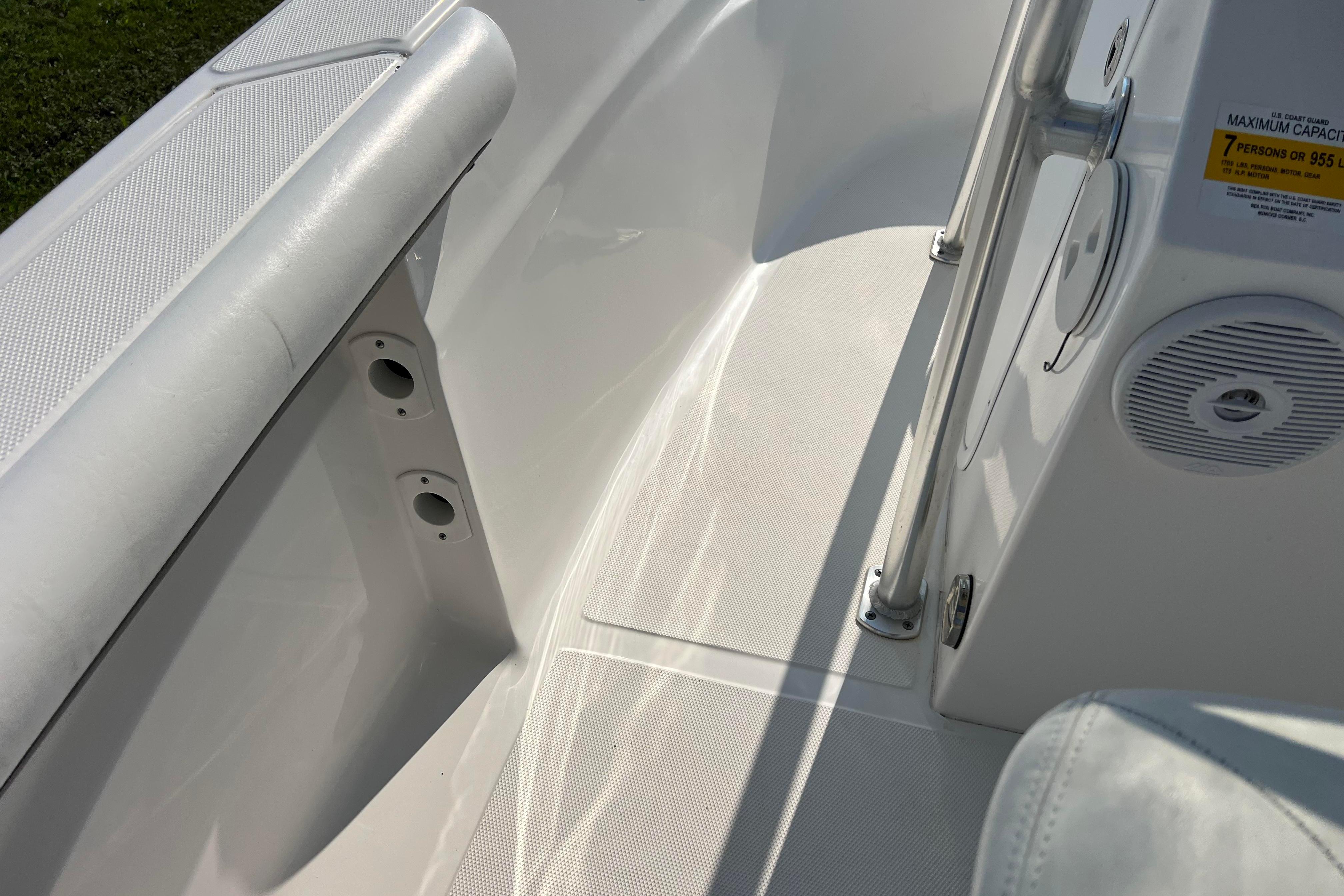 2012 Sea Fox 206 Center Console interior, featuring seating and speaker details.