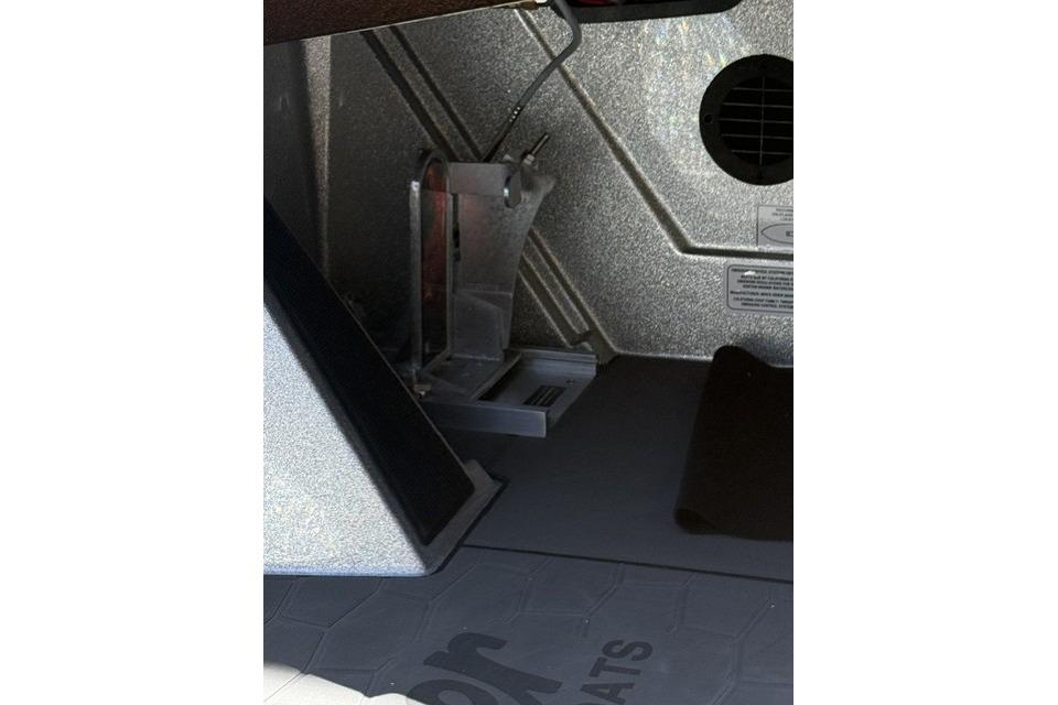 Interior view of 2026 Ranger Z521R Cup-Equipped boat, showcasing pedal and floor details.