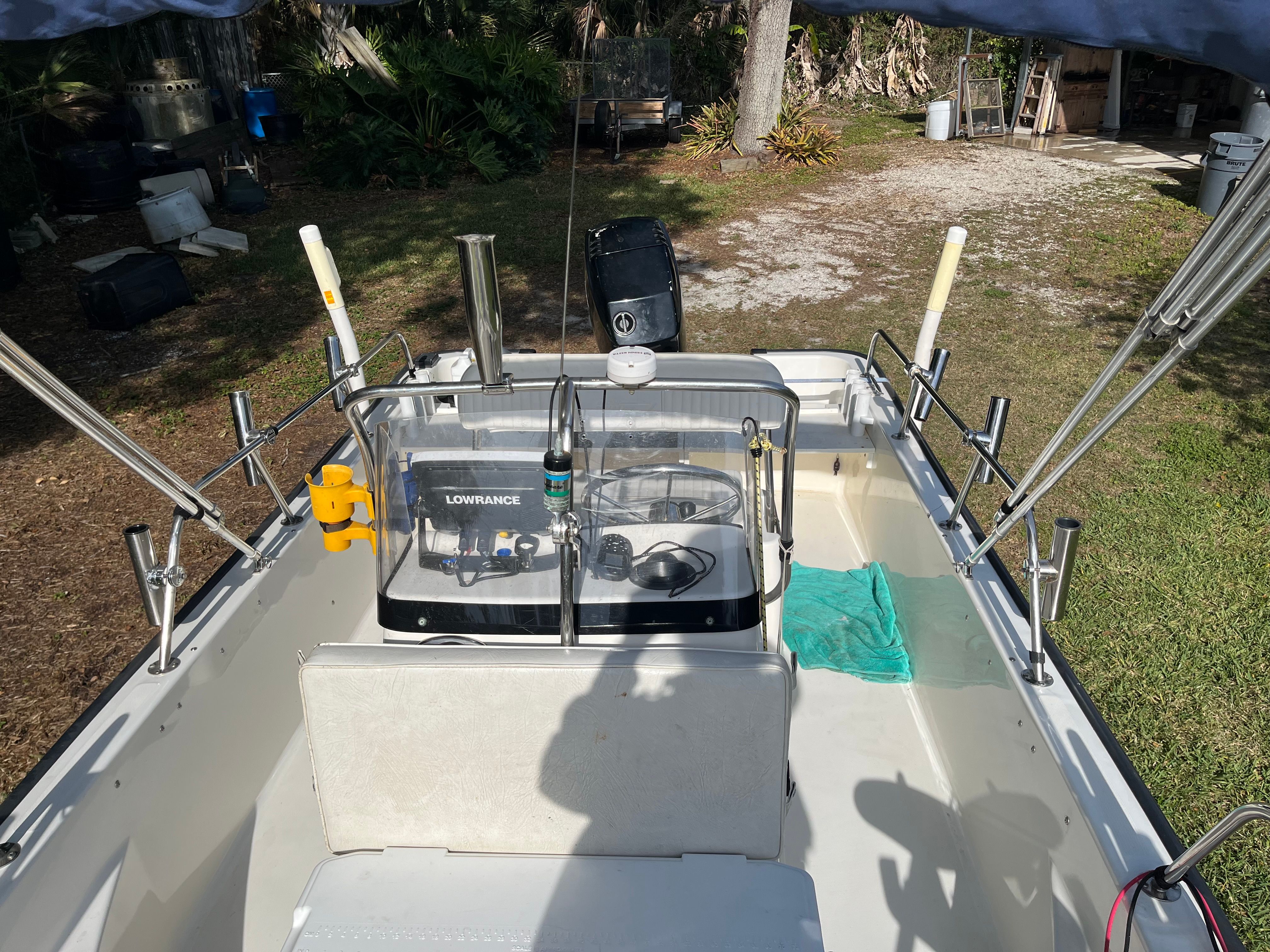 Interior view of a 2005 Boston Whaler 170 Montauk boat outdoors.