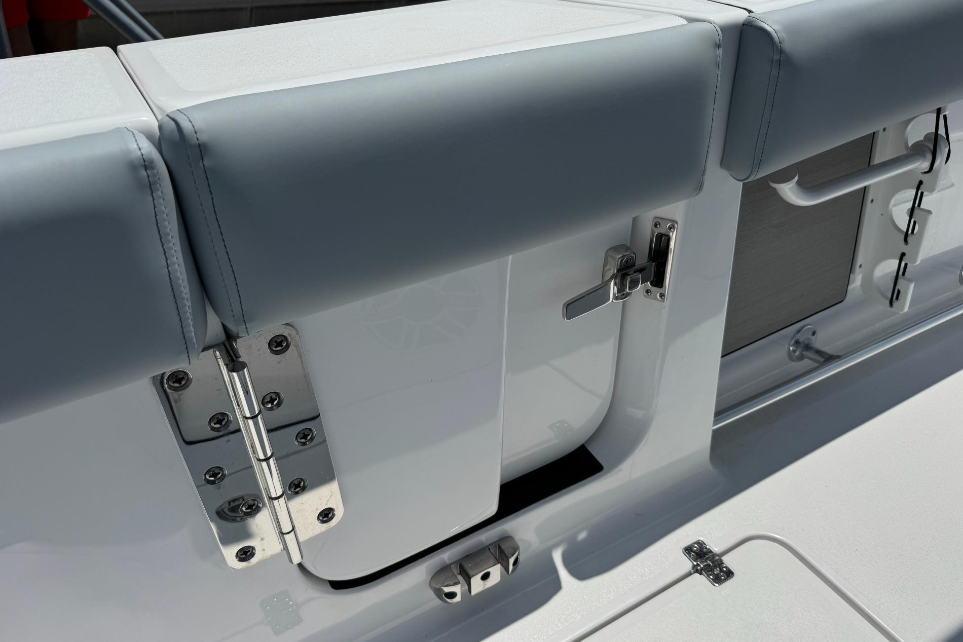 2026 Sportsman Open 262 Center Console boat interior, featuring sleek seating and stainless steel hardware.