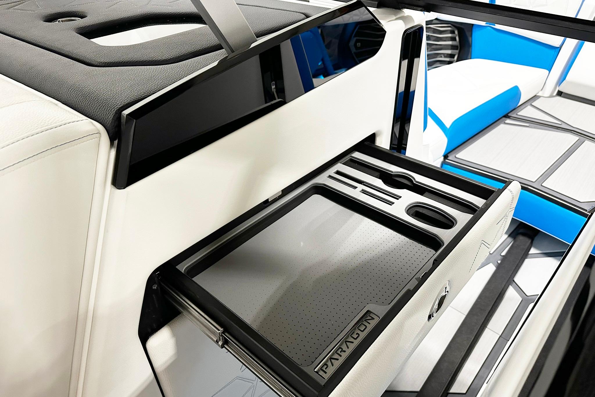 2025 Nautique Super Air Nautique G23 Paragon interior storage compartment detail.