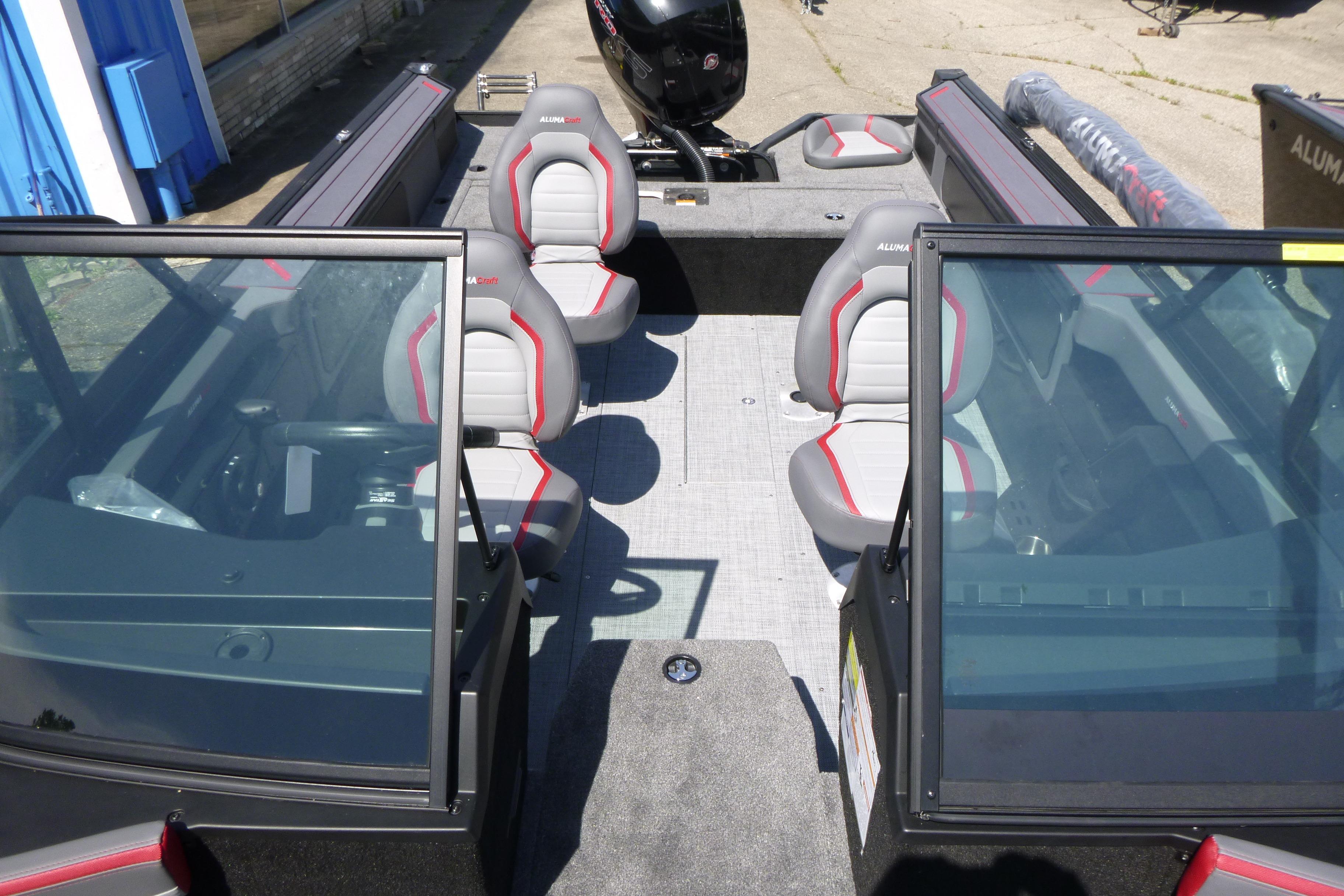2025 Alumacraft Trophy 185X Sport boat interior with seating and windshield.