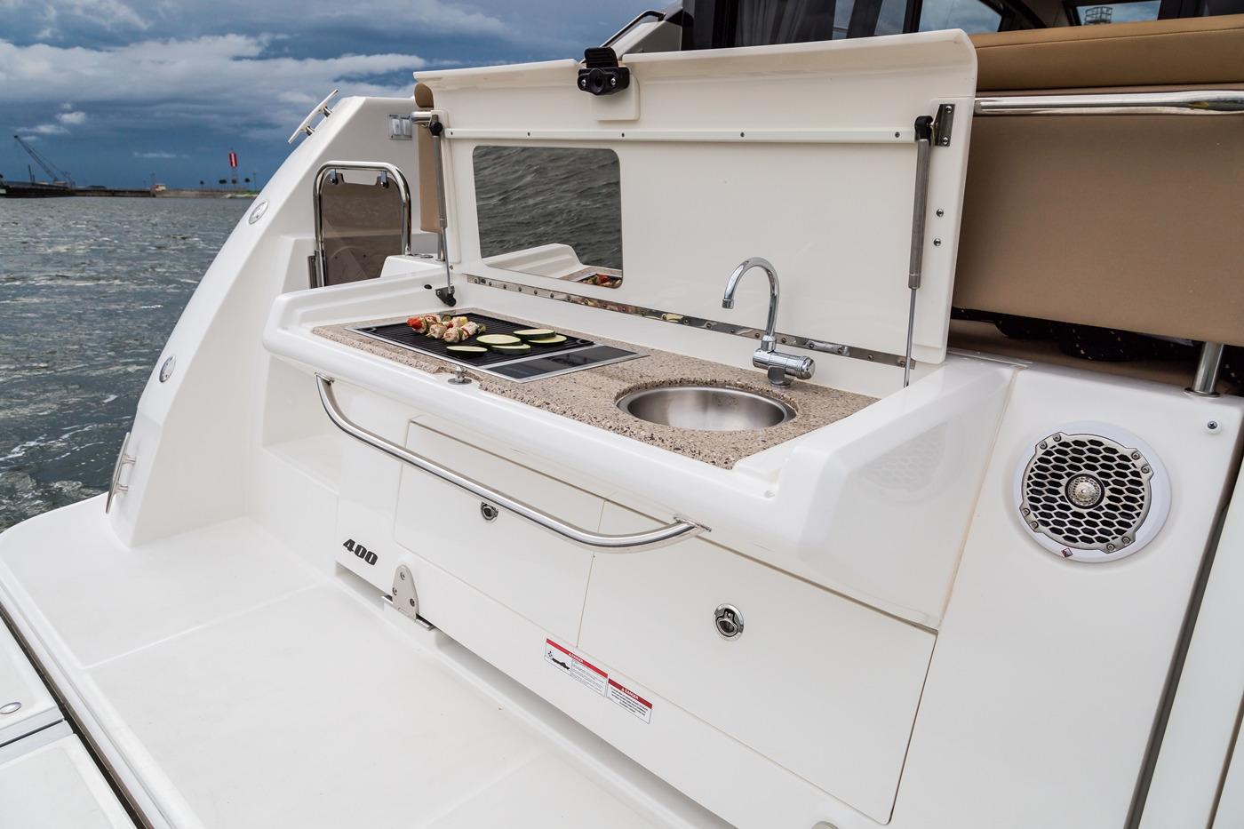 Manufacturer Provided Image: 2018 Sea Ray Fly 400 yacht outdoor kitchen with sink and grill.