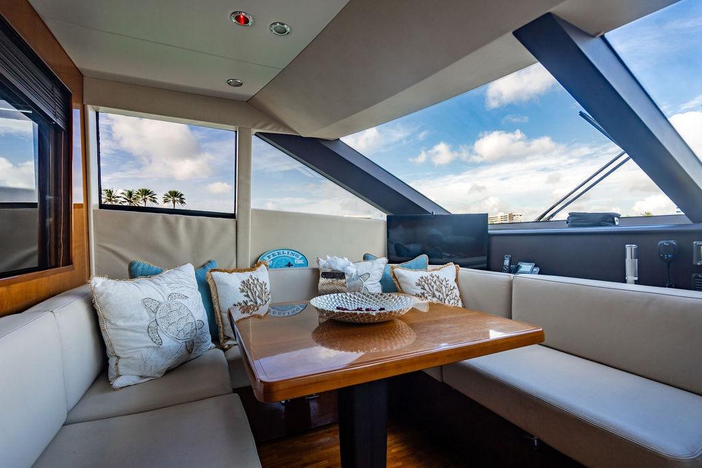 Luxurious interior of 2010 Princess 95 Motor Yacht with elegant seating and decor.