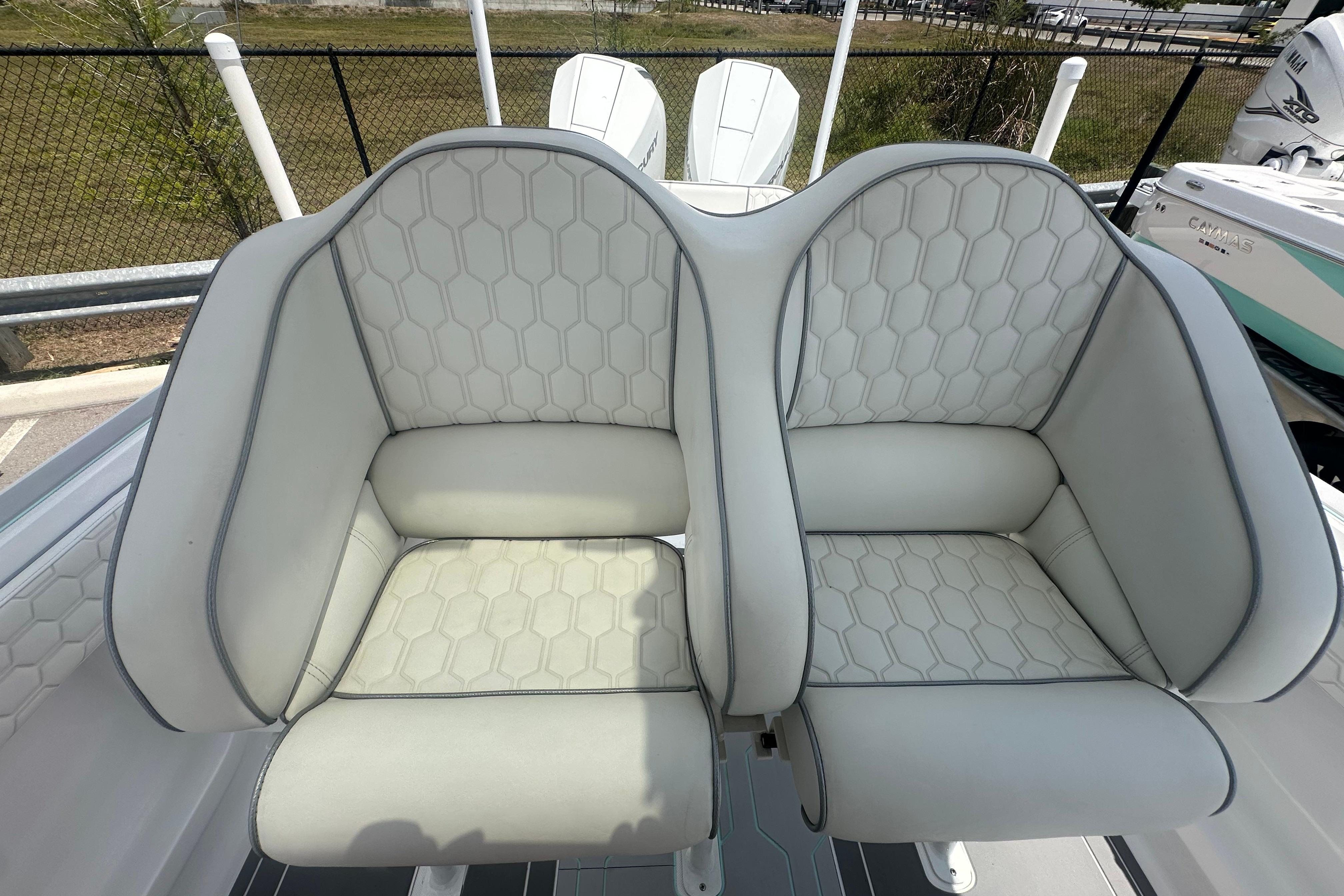 2022 Glasstream 280 Pro-XS boat seats with hexagonal pattern upholstery.