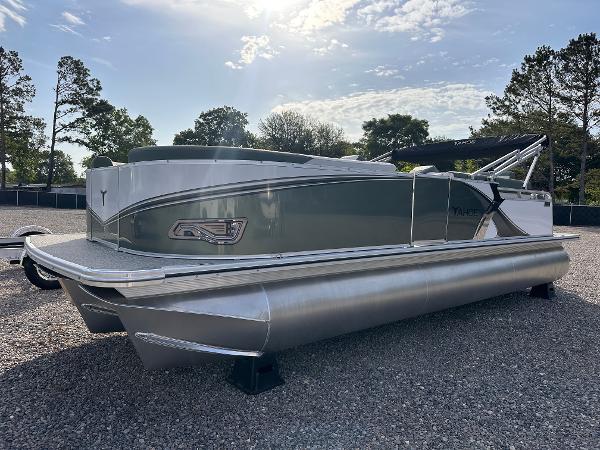 2025 Tahoe Pontoon LTZ Cruise Rear Bench on gravel lot, under sunny sky.
