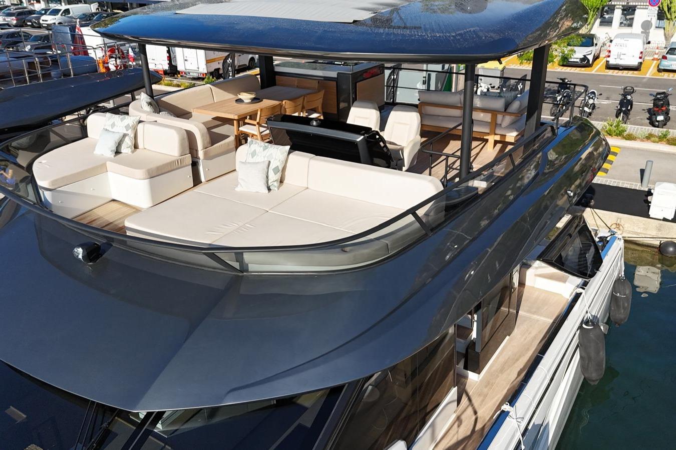 Luxurious 2026 Prestige M7 yacht with spacious deck and elegant seating area.