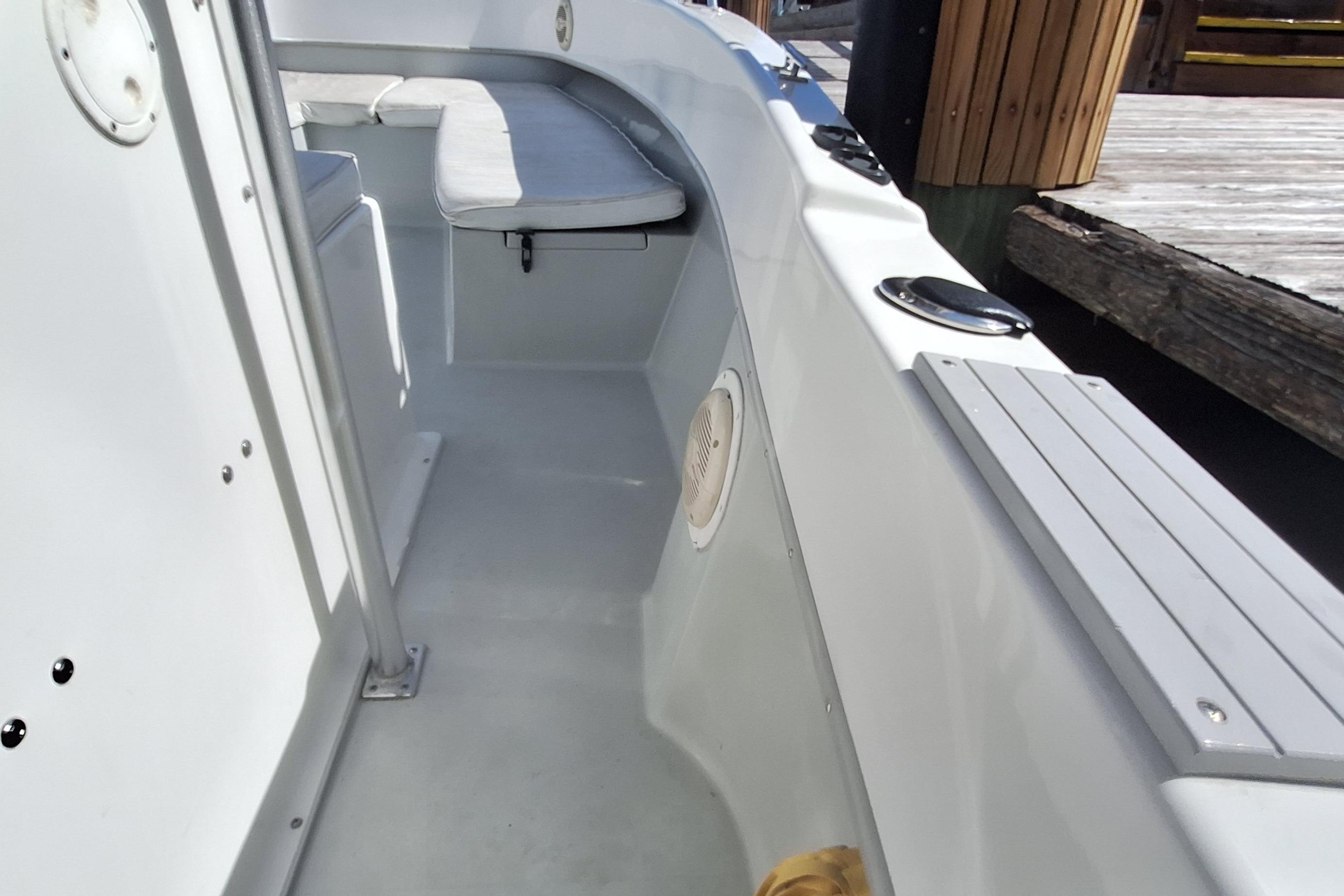 Interior view of a 2001 Dusky 252 Open Fisherman boat.