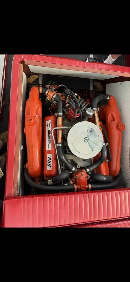 1965 Century Sabre engine with red covers.
